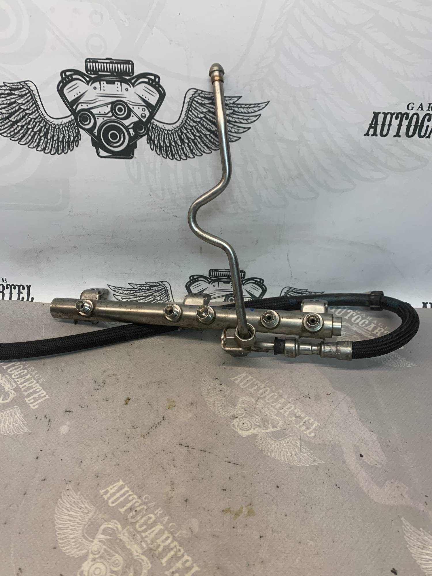 Паливна рейка n43b20 bmw e90 e91 2. 0i 7562474-03