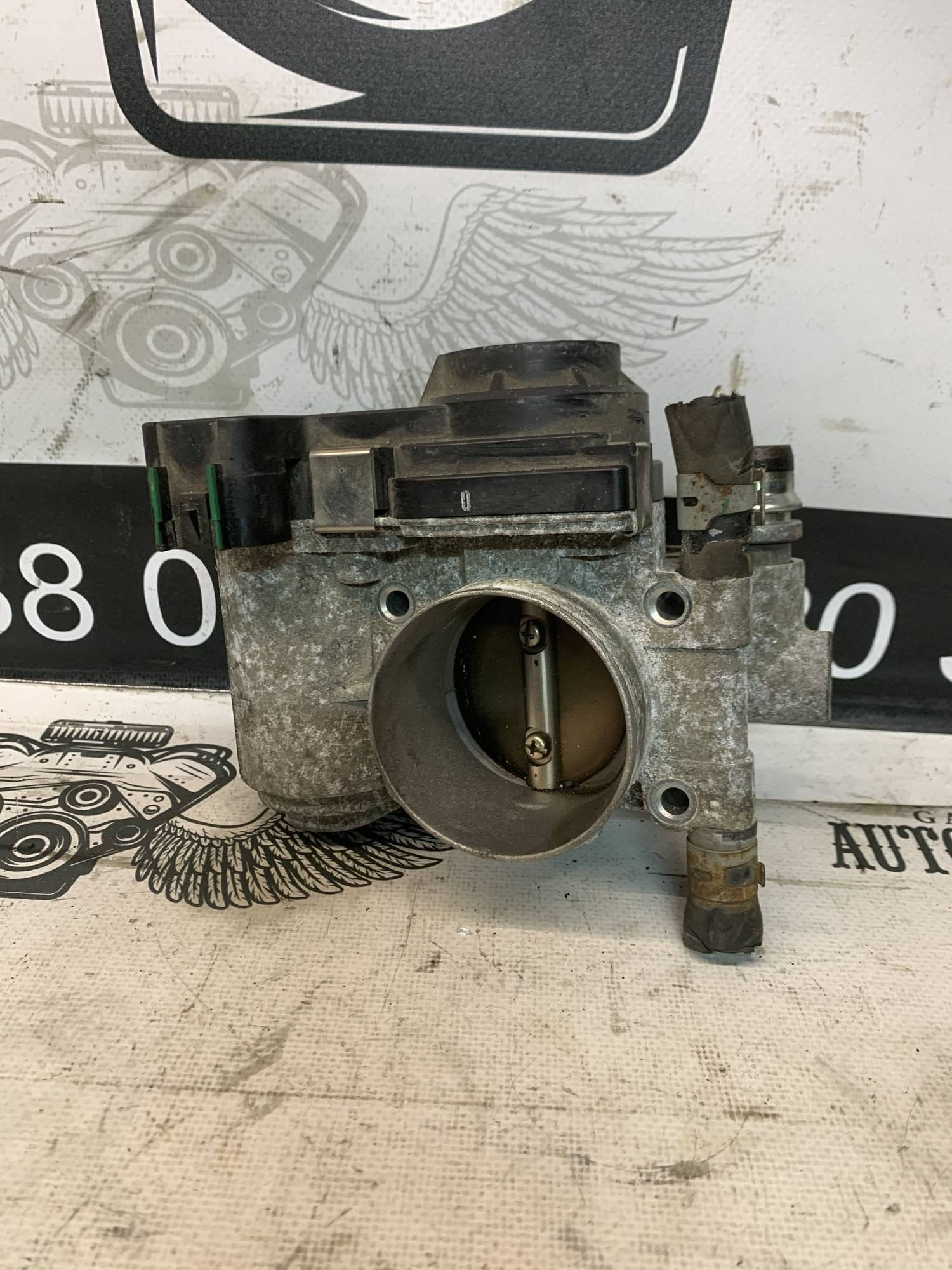 Дросельна заслінка електрична Opel Astra H 1.6 16V 055559227
