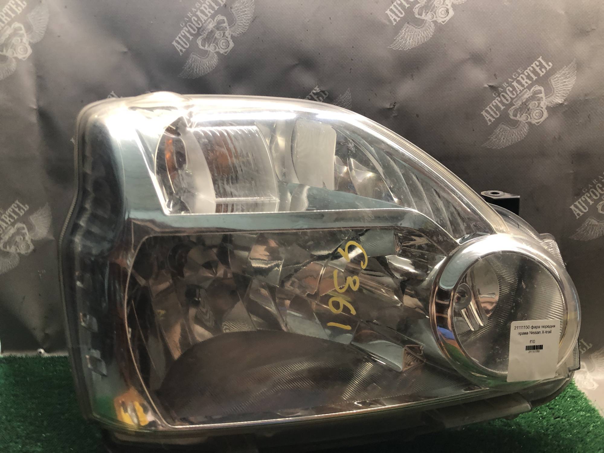 21111150 фара передня права Nissan X-trail
