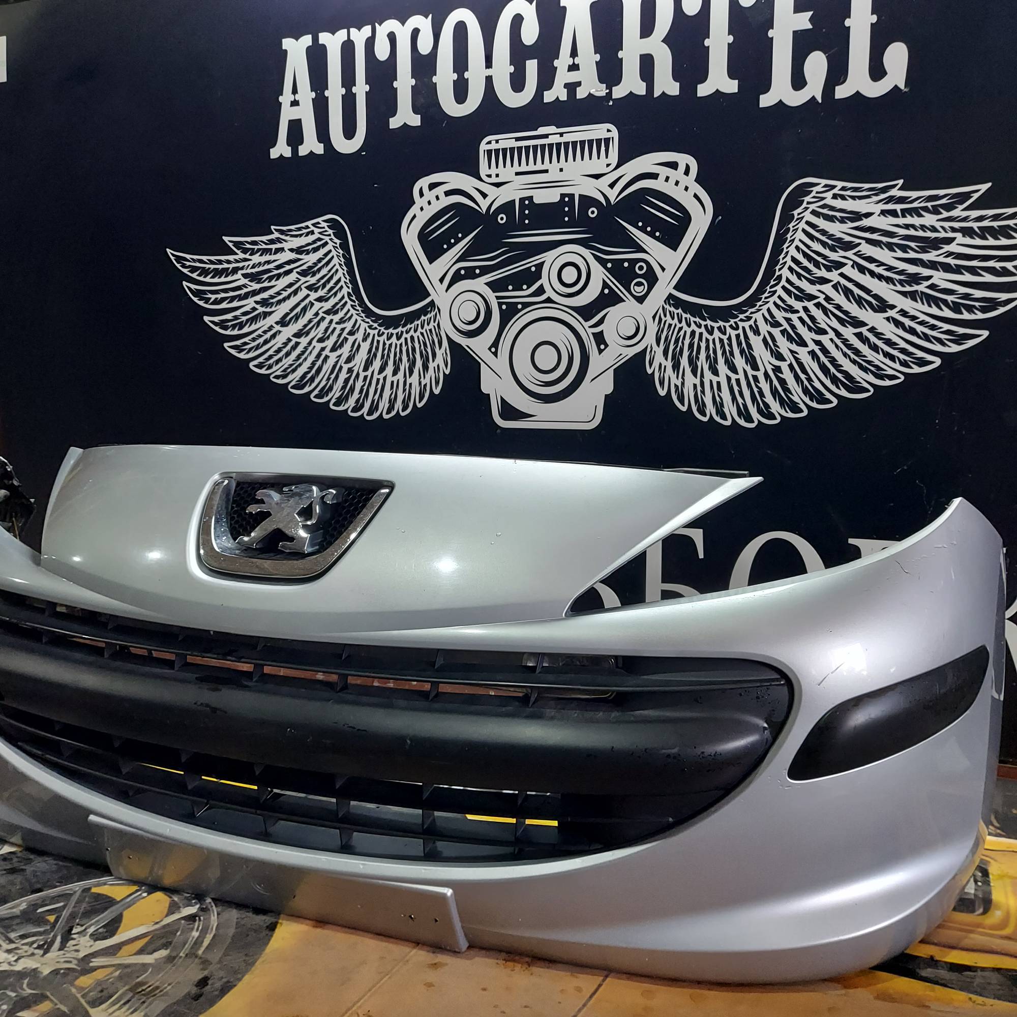 Бампер передній Peugeot 207 2006-2012 дорест 21413636