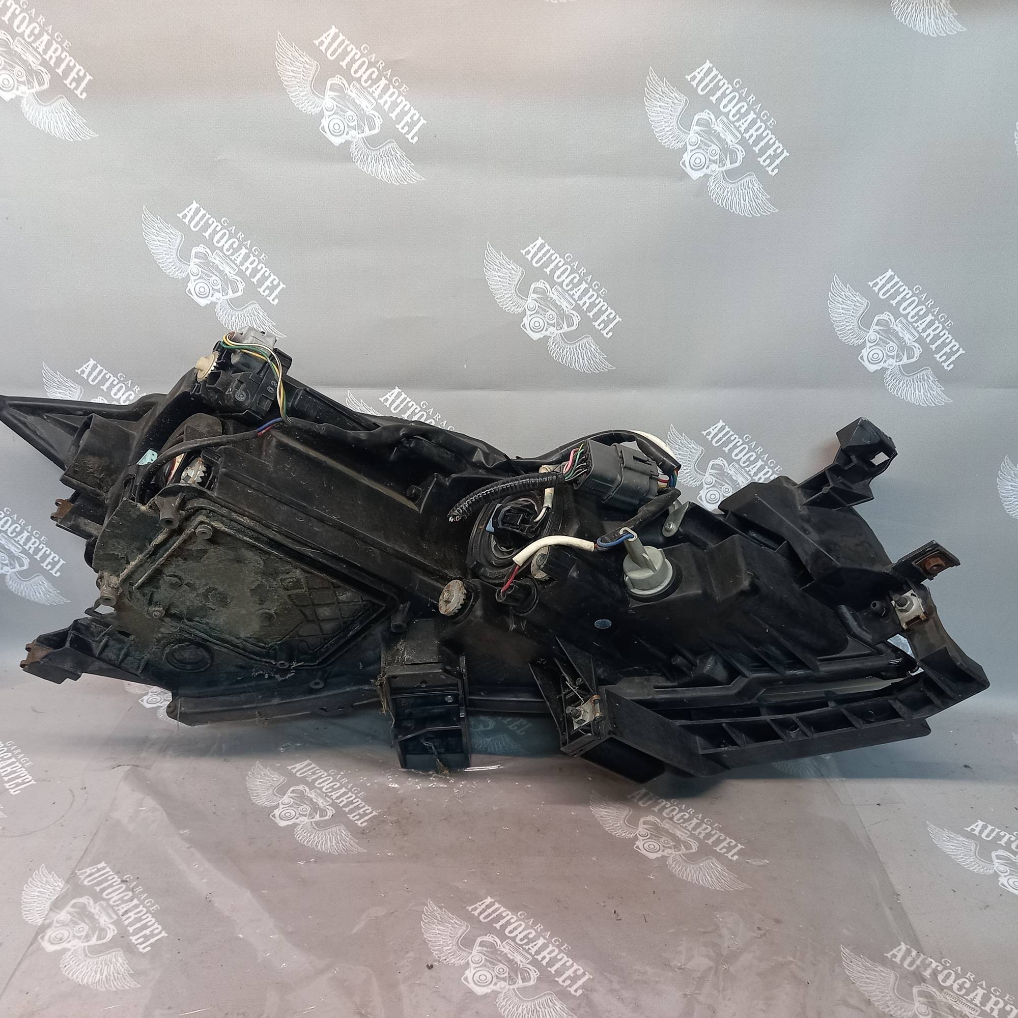 Фара ліва лінза з електрокоректором Mazda 6 GH 08-12 GS1F510L0G