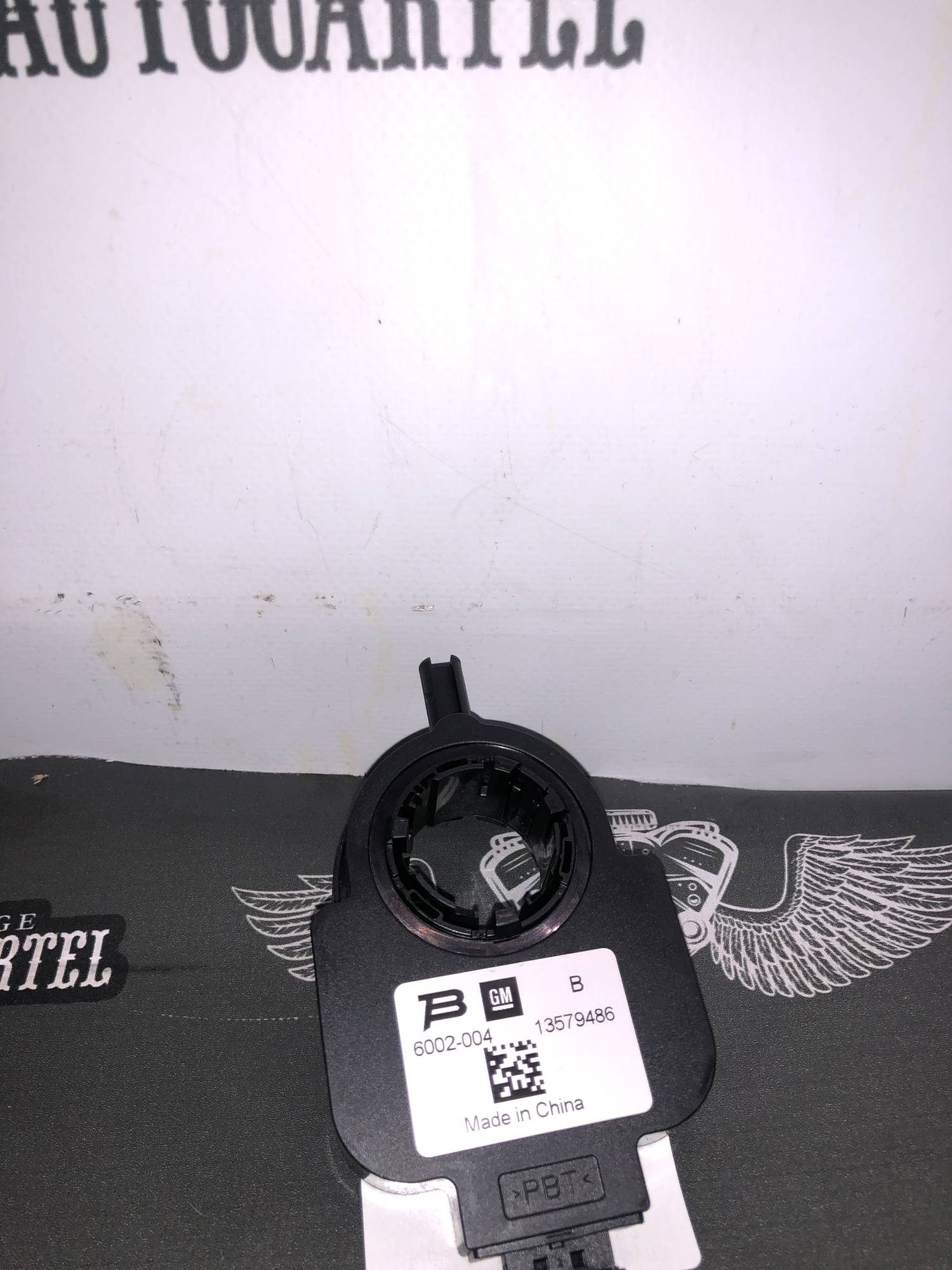Датчик угла поворота руля Opel Astra J 13579486