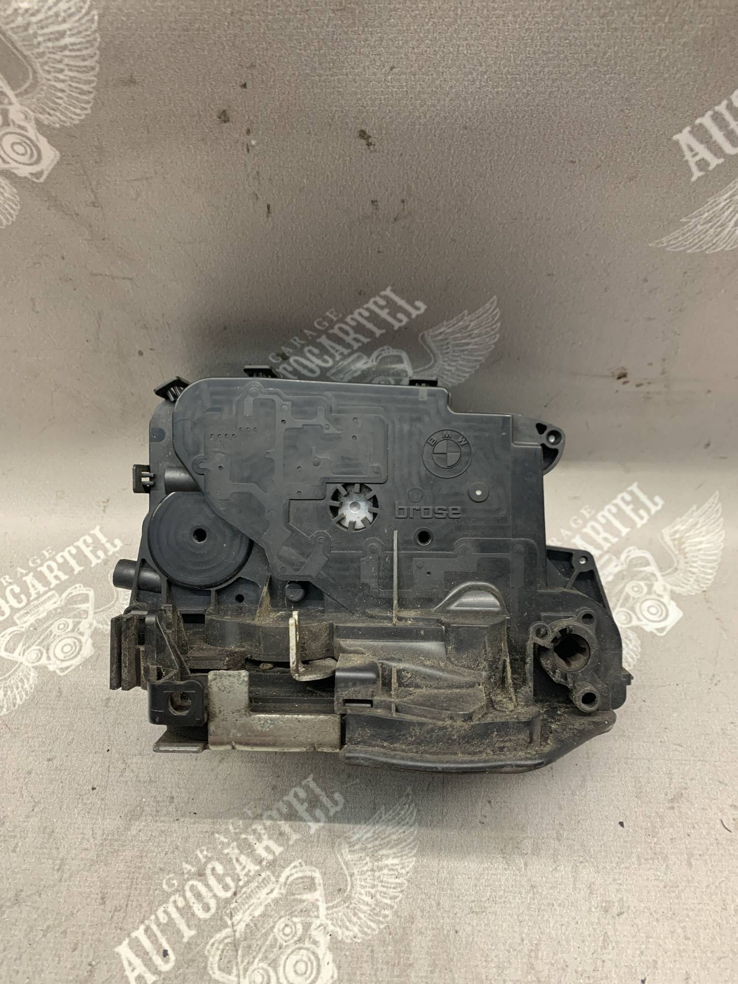 Замок двері передньої лівої BMW E90/91 7059967
