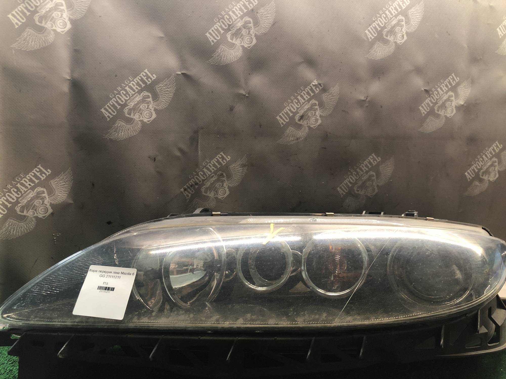 Фара передня ліва Mazda 6 GG 21111211