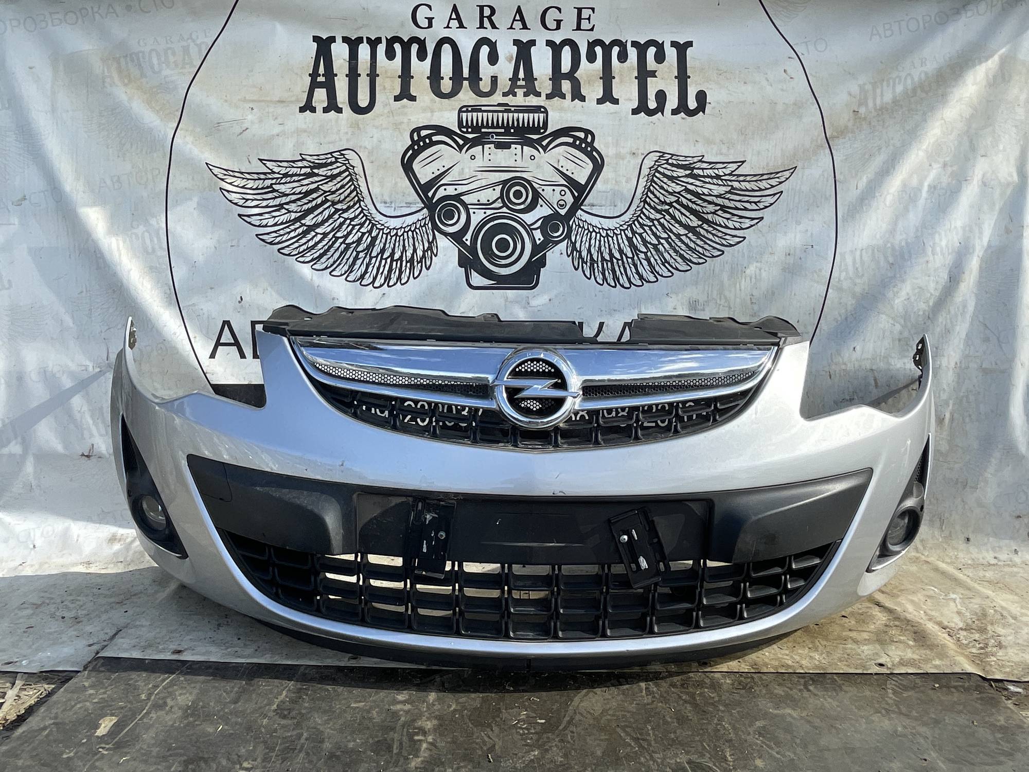 Бампер передній Opel Corsa D рест 13285996 21119613