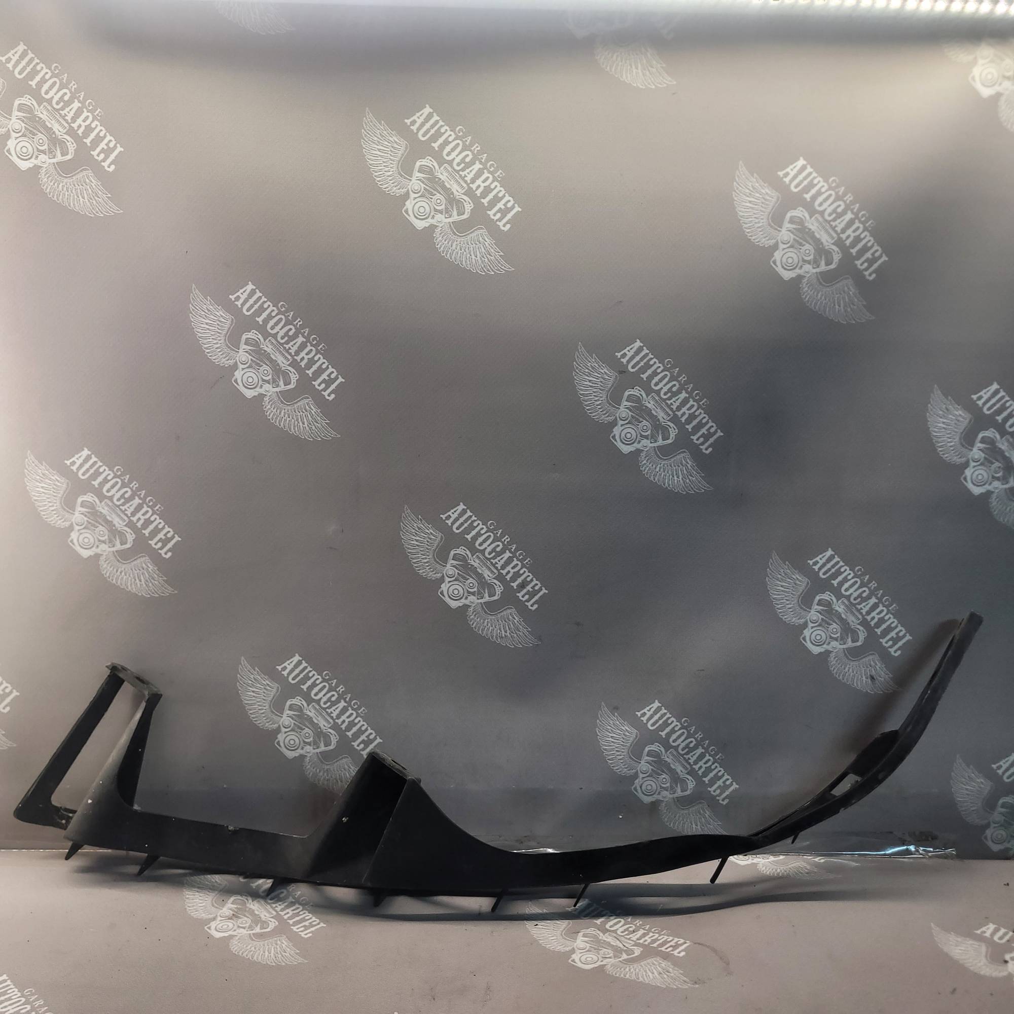 Кронштейн фари правої Mazda 6 GG GJ6A50151