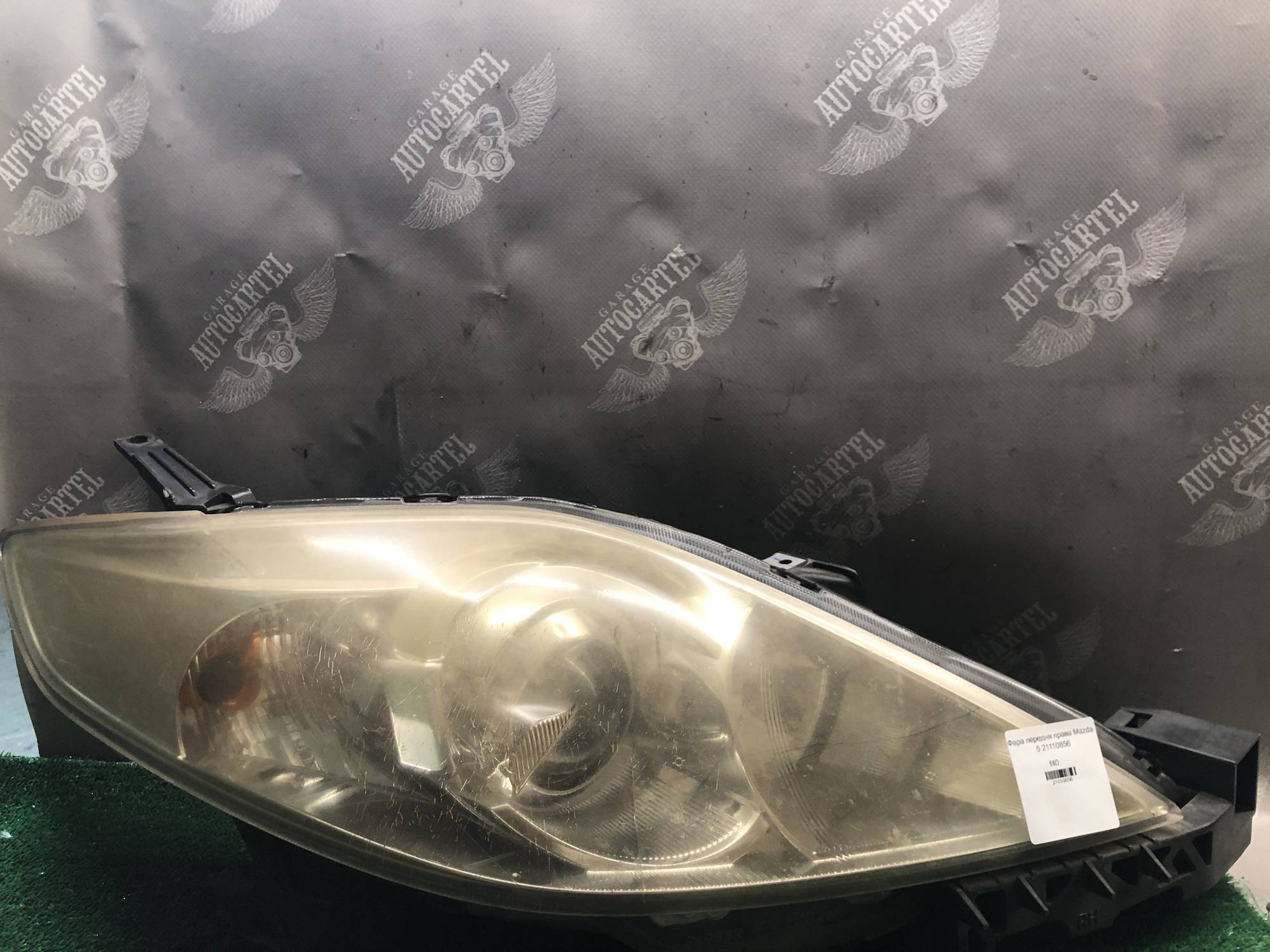 Фара передня права Mazda 5 21110856
