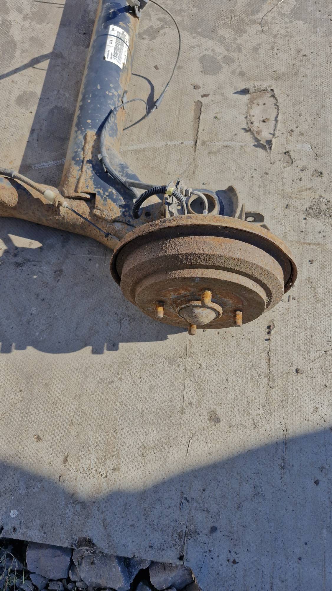 Балка задня під барабан Ford Fusion 21534935