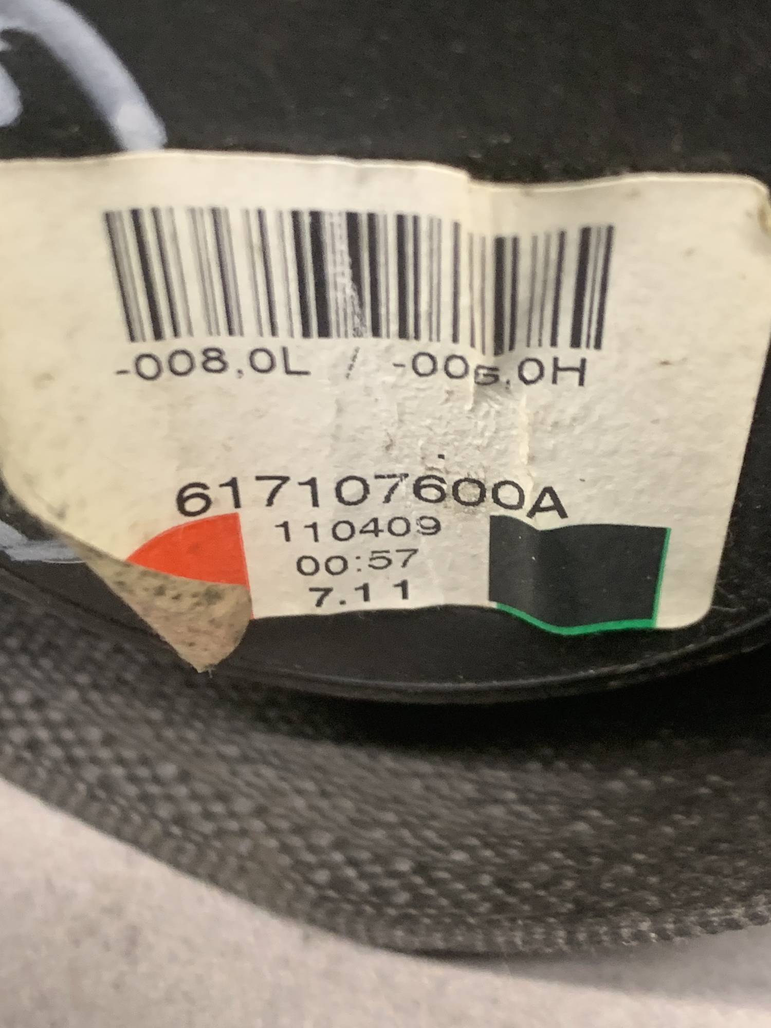 Ремінь безпеки передній лівий Opel Corsa D 617107600a