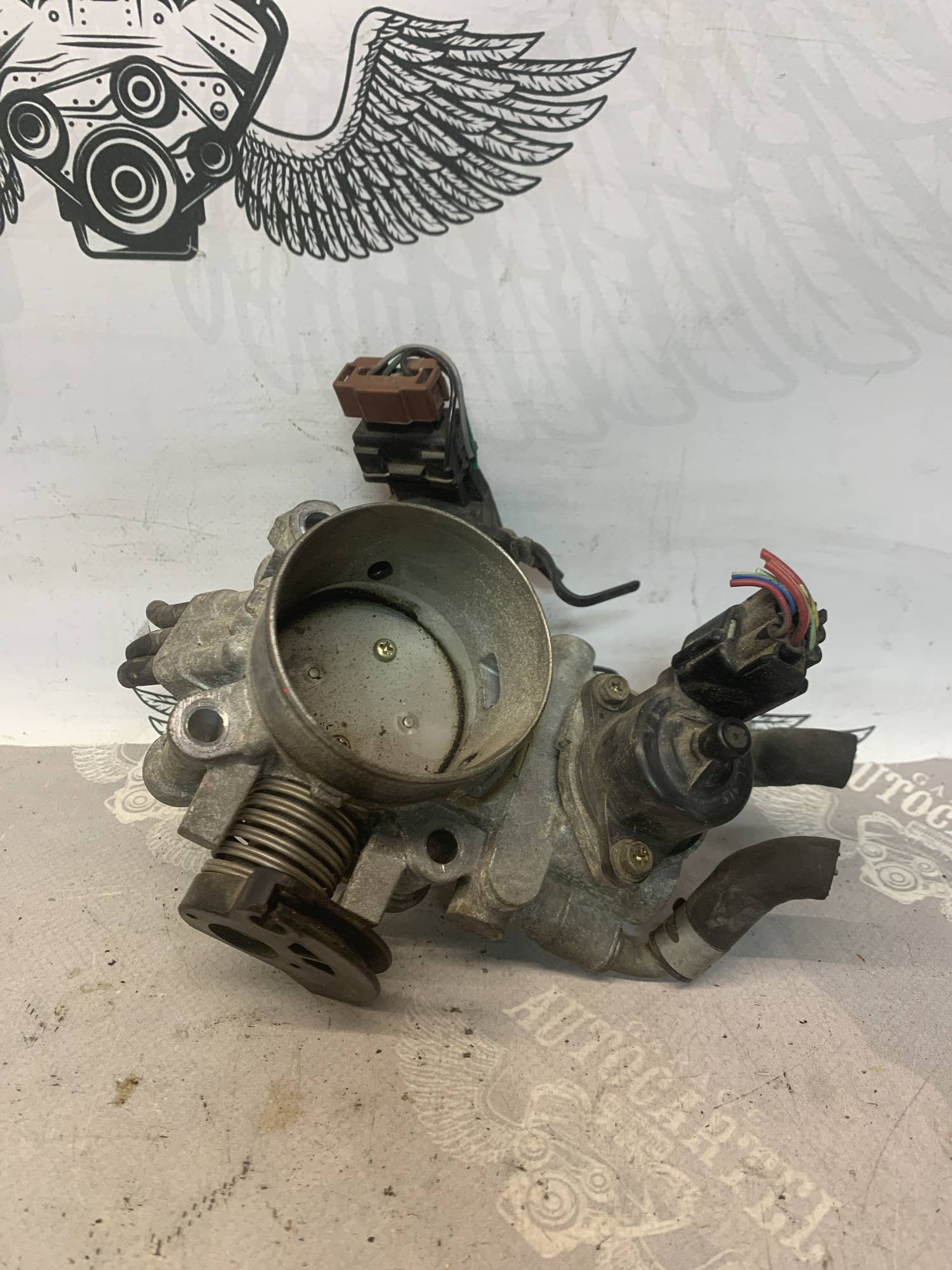 Дросельна заслінка Mitsubishi Outlander рестал 2,0i mn153310