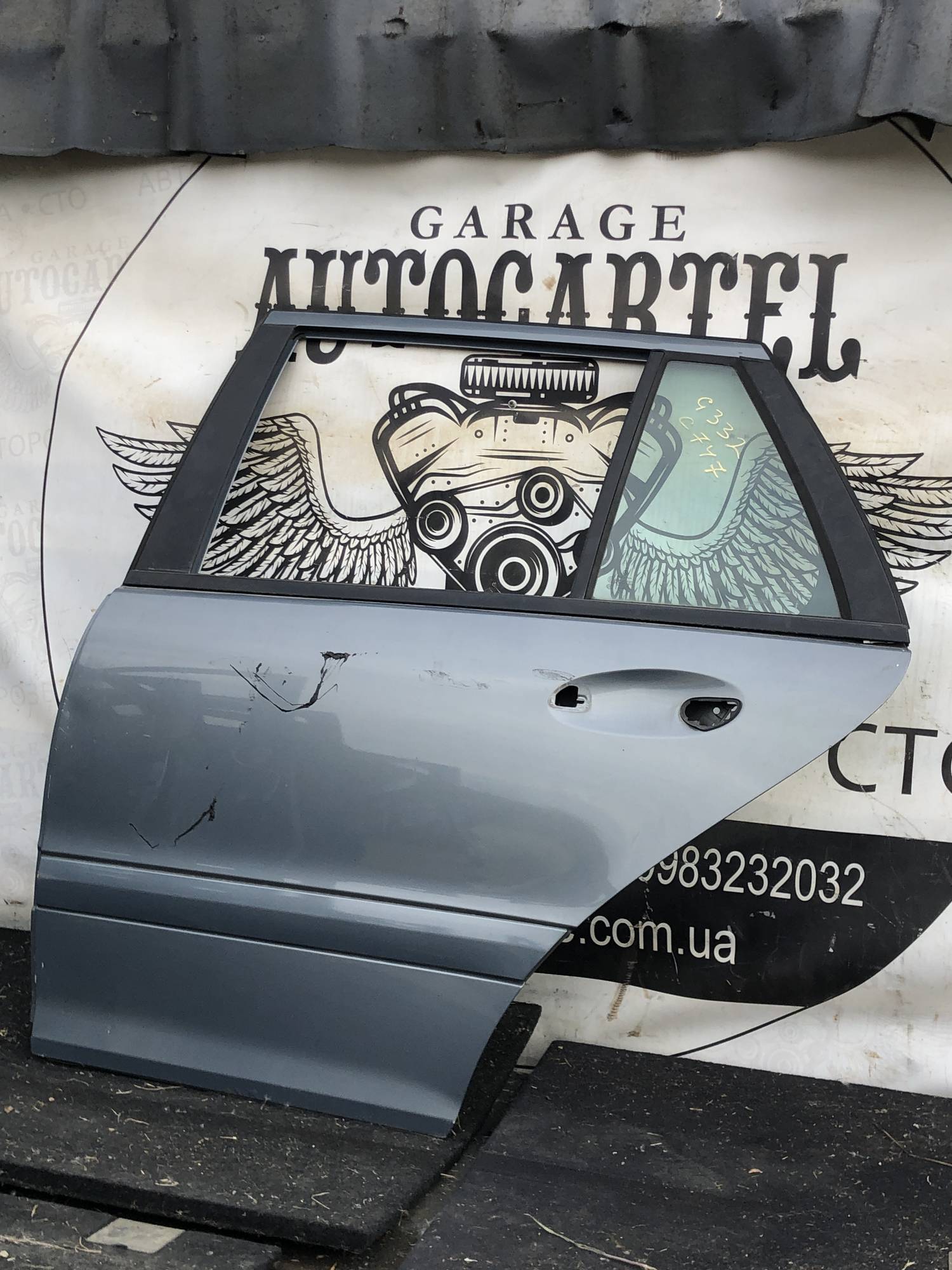 Дверка задня ліва Mercedes W203 c class універсал 21104182