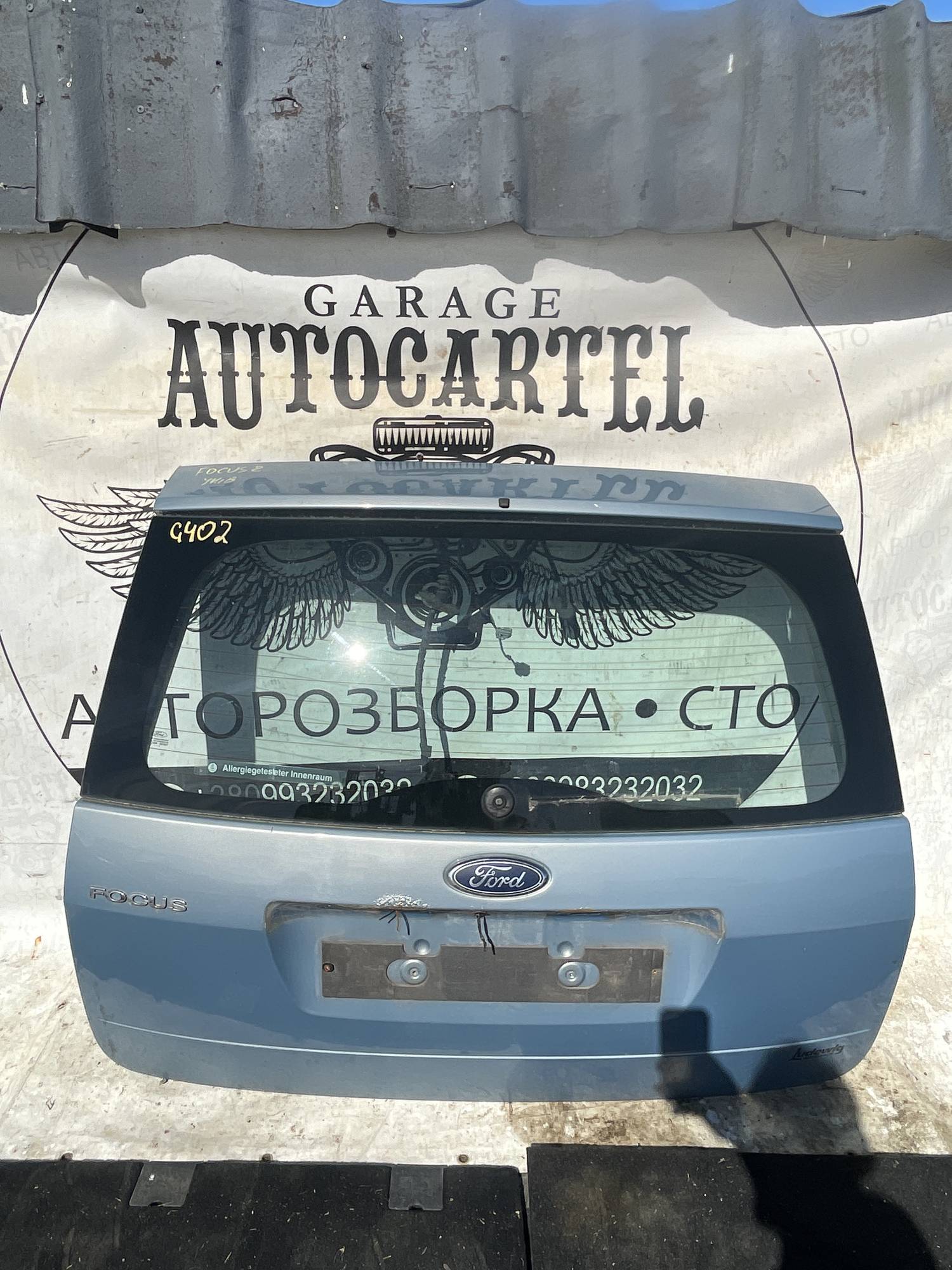 Кришка багажника задня ляда Ford Focus 2 унів 21120138