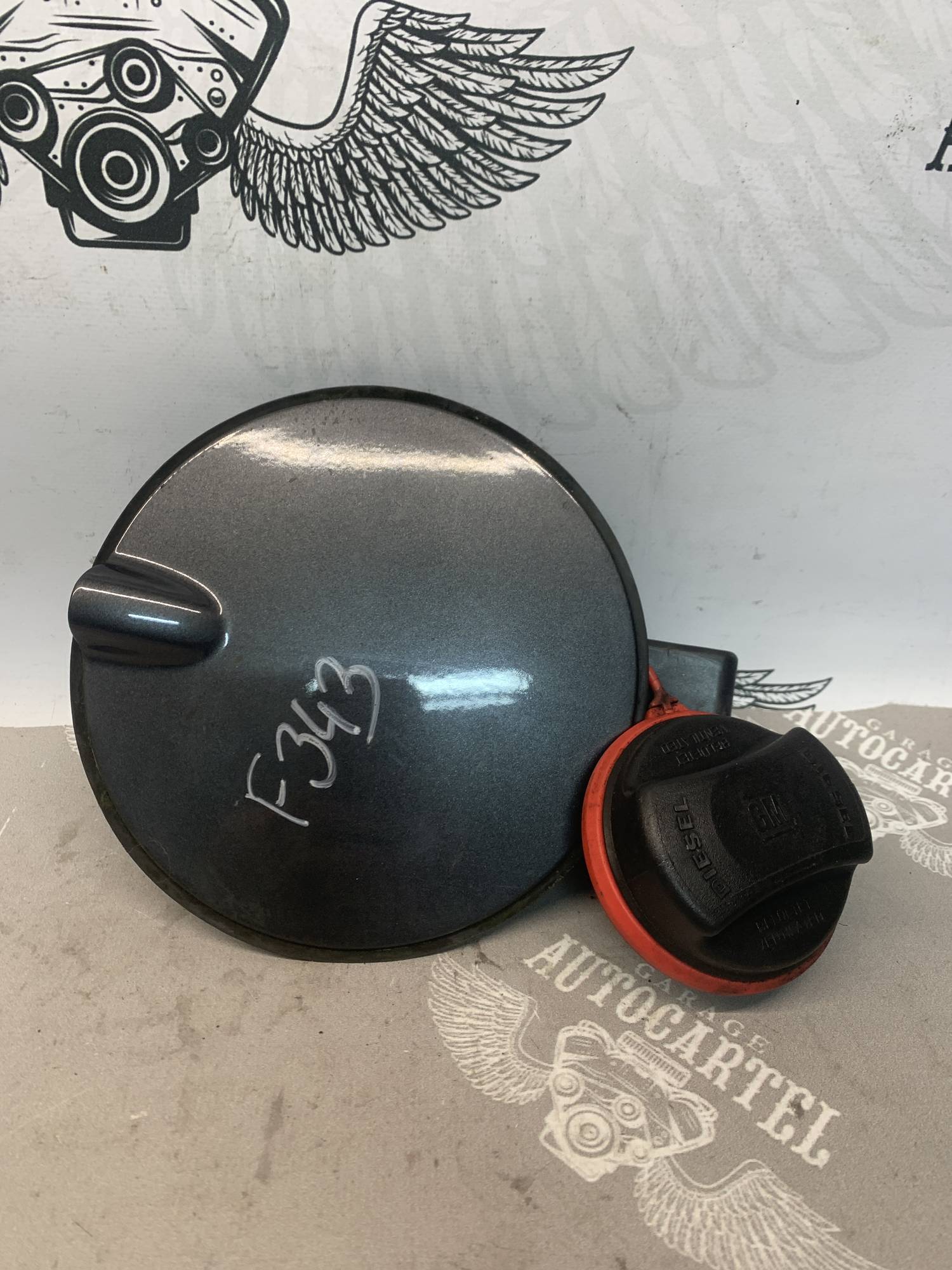 Лючок топливного бака Opel Corsa D 13183307, 21707445