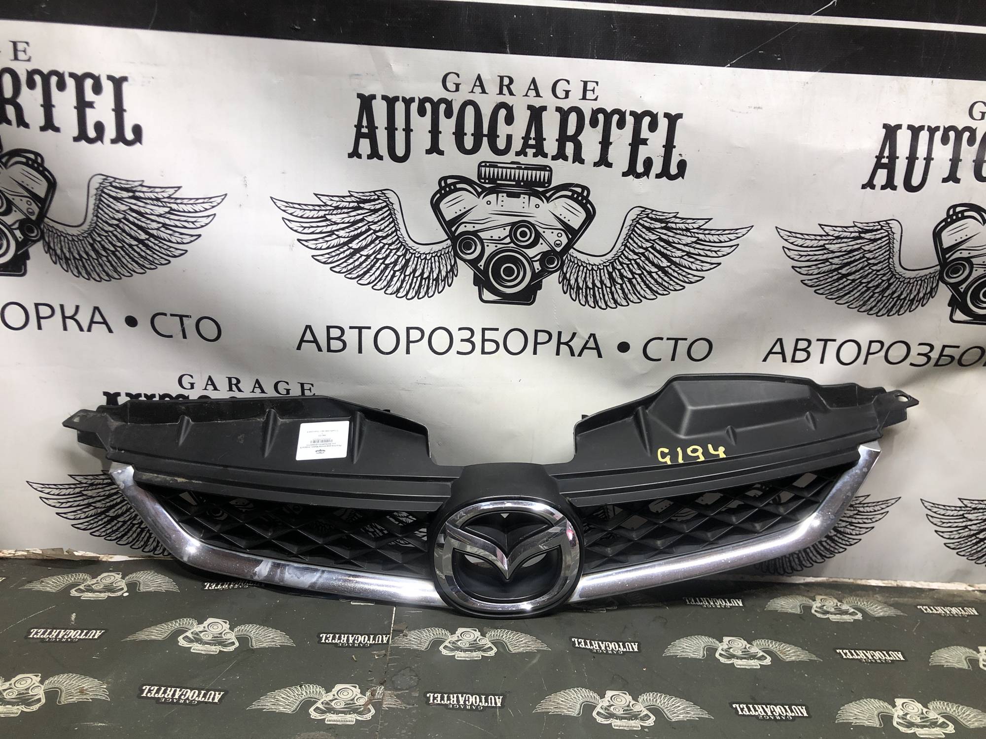 Решітка радіатора Mazda mazda 5 (cr) 2005-2010 с23550711