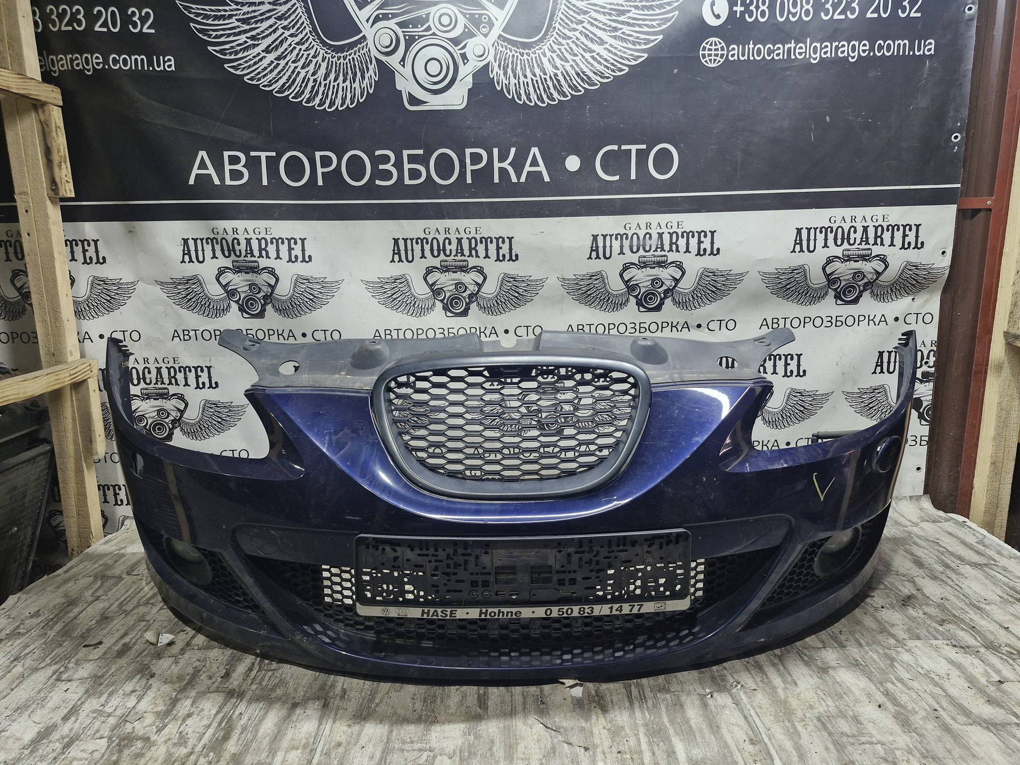 Бампер передній Seat Leon під омивачі 21644306