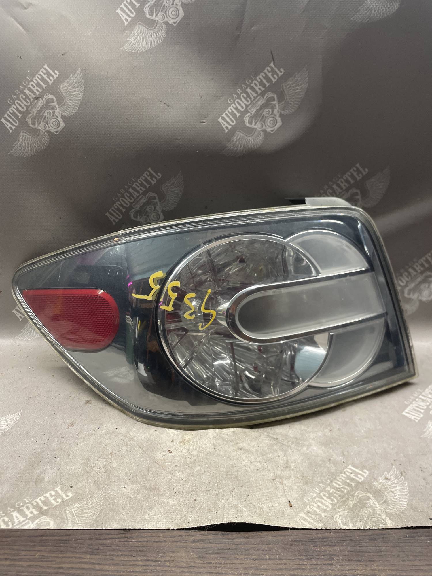Ліхтар задній лівий Mazda CX7 E22151150B