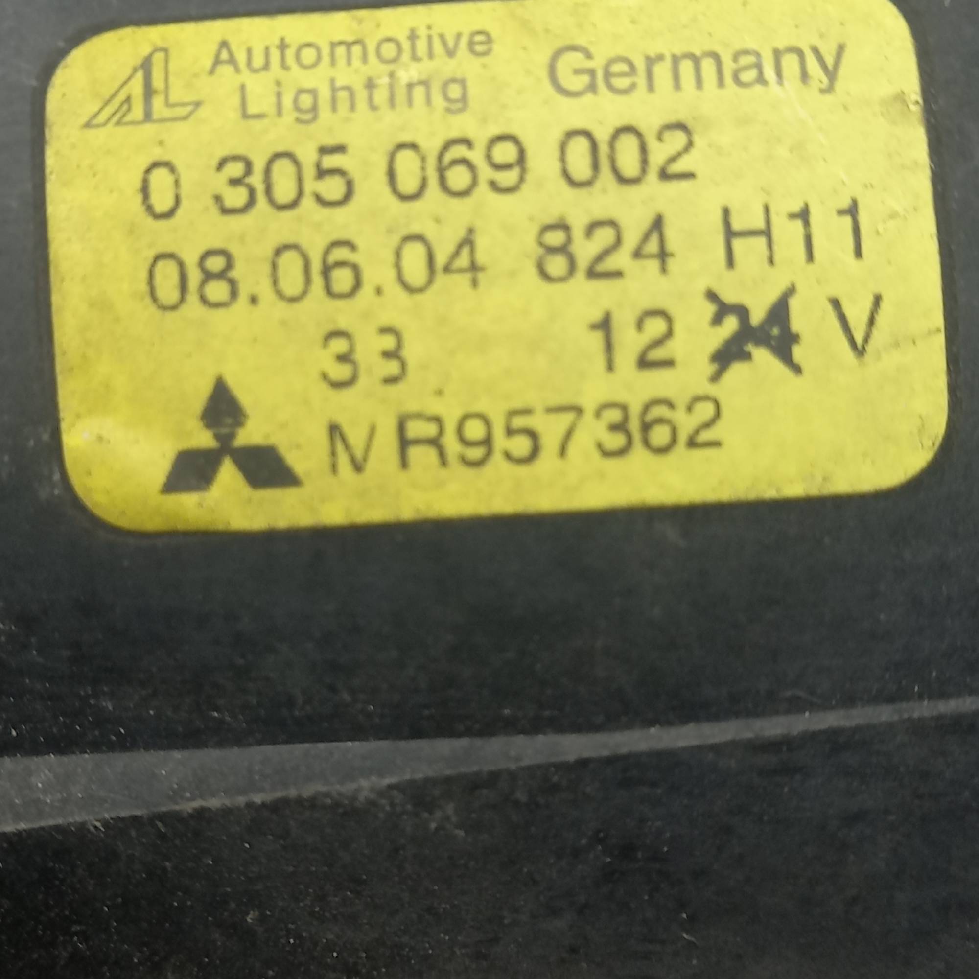 Фара противотуманна права Mitsubishi Colt mr957362