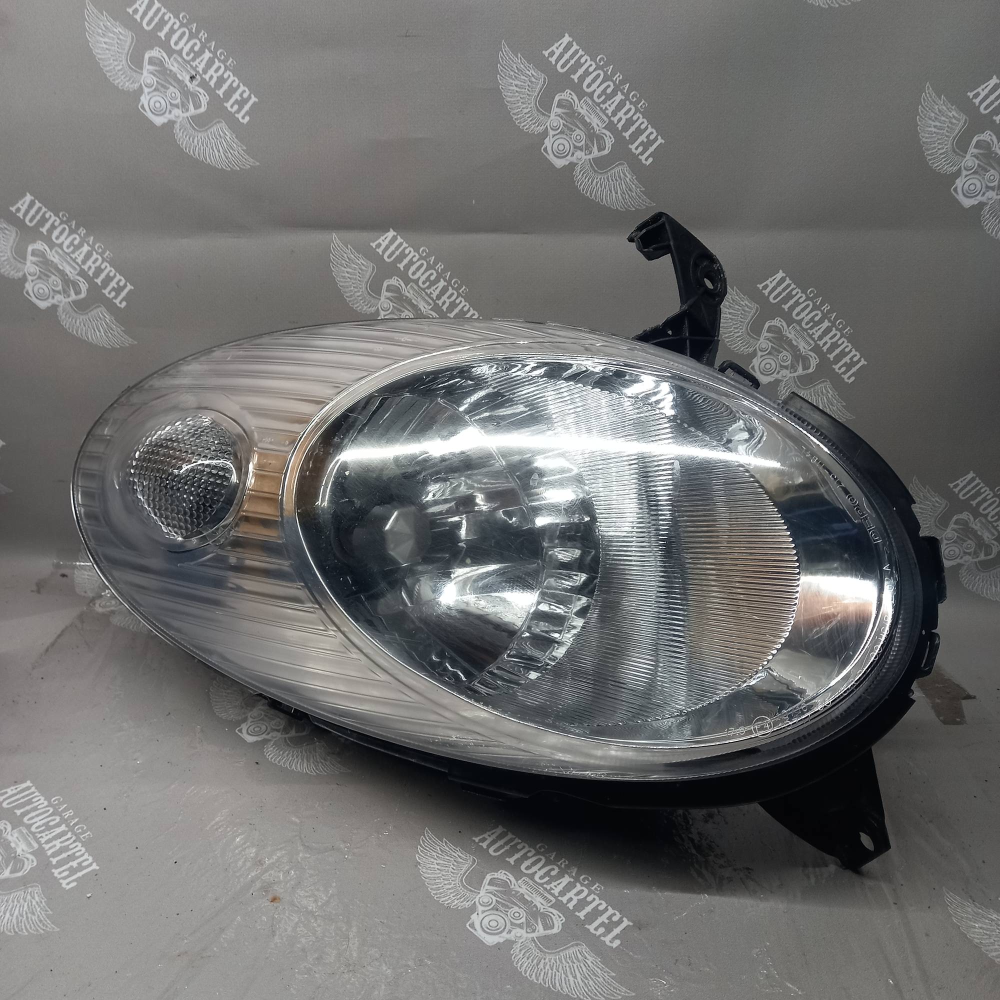 Фара передня ліва Nissan Micra K12 02-08 08-215-1194l