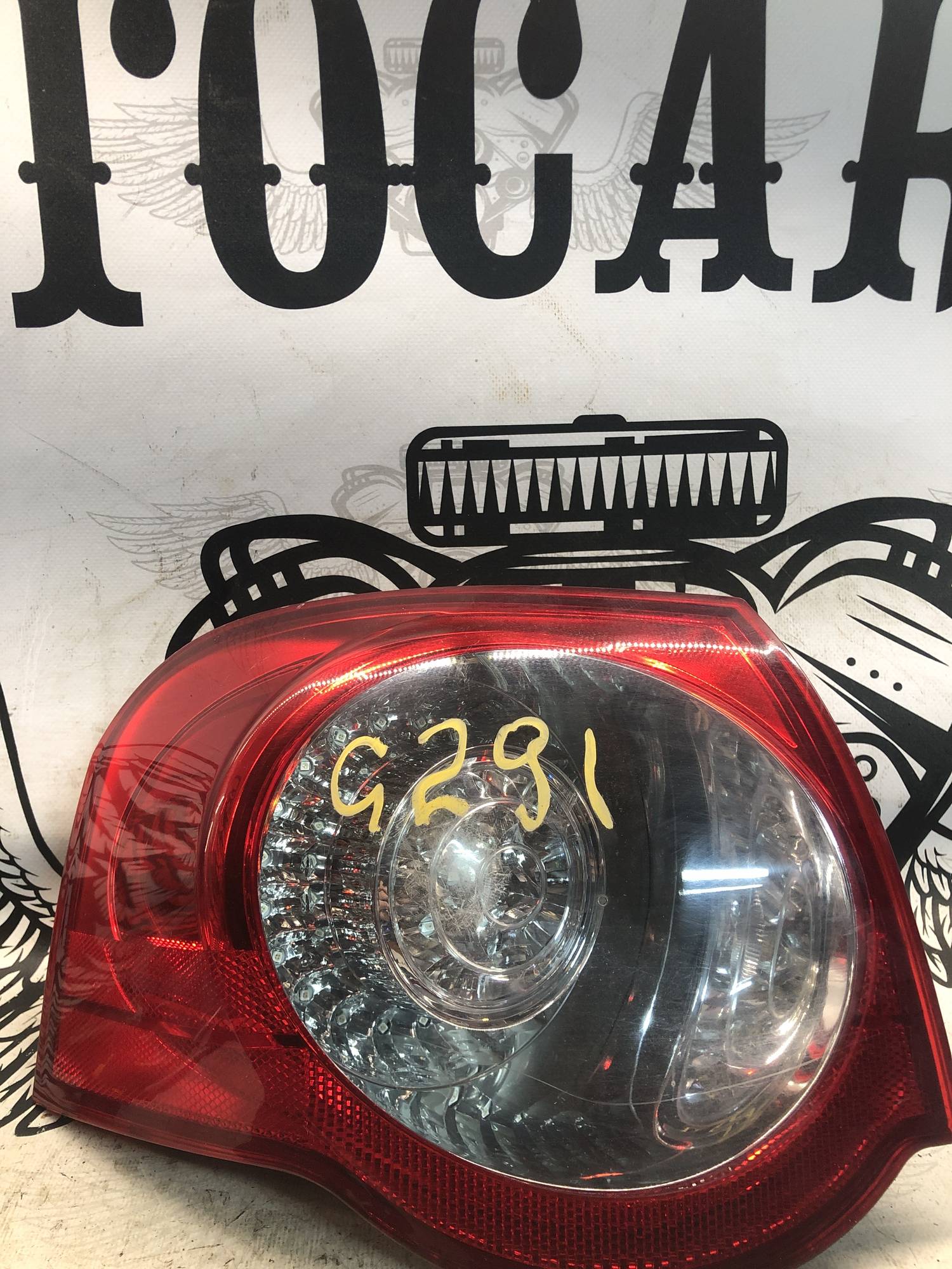 Ліхтар задній лівий Volkswagen passat b6 21910104