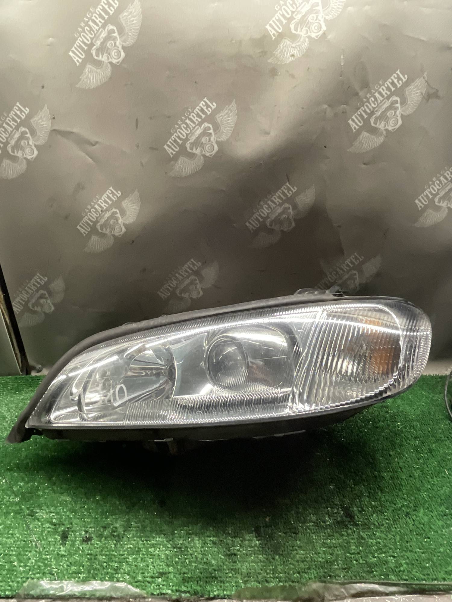 Фара передня ліва ксенон Opel omega b рестайлінг 1el009050-21