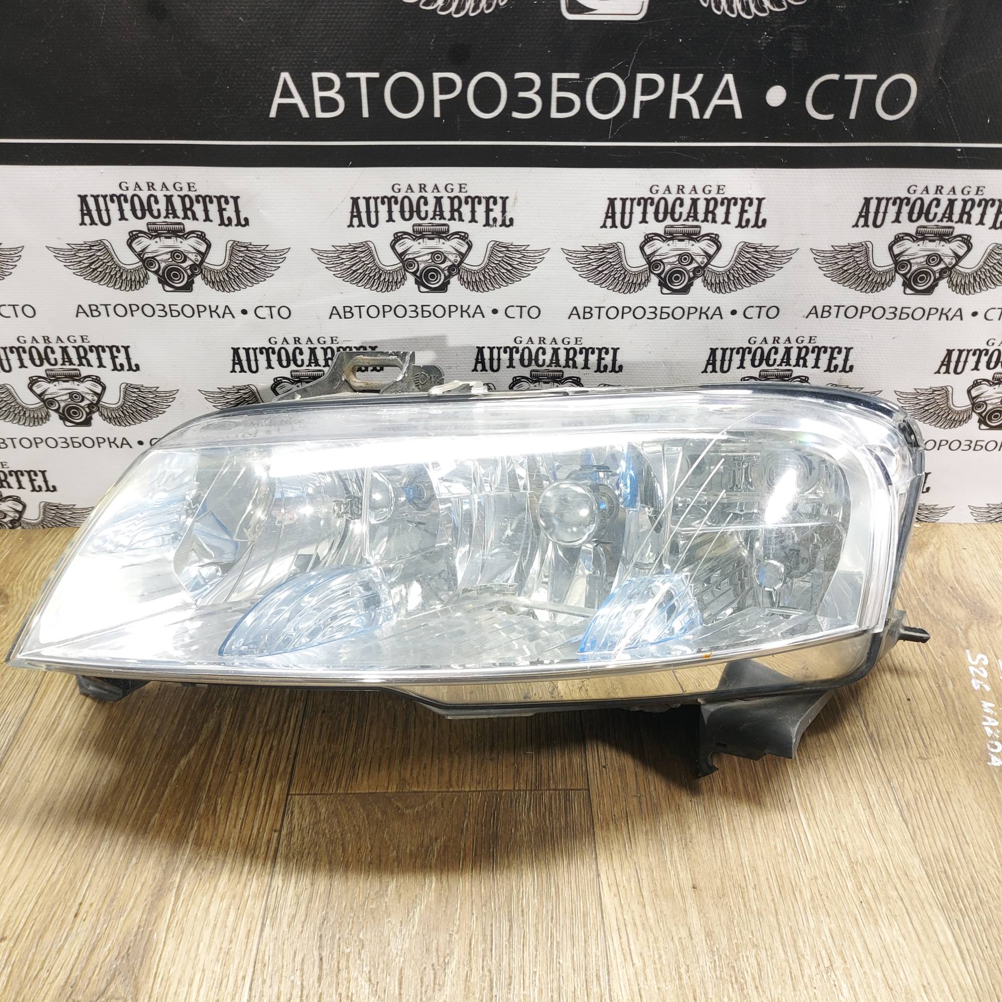 Фара ліва галоген (дефект скла, кріплення) Fiat Stilo 40795748