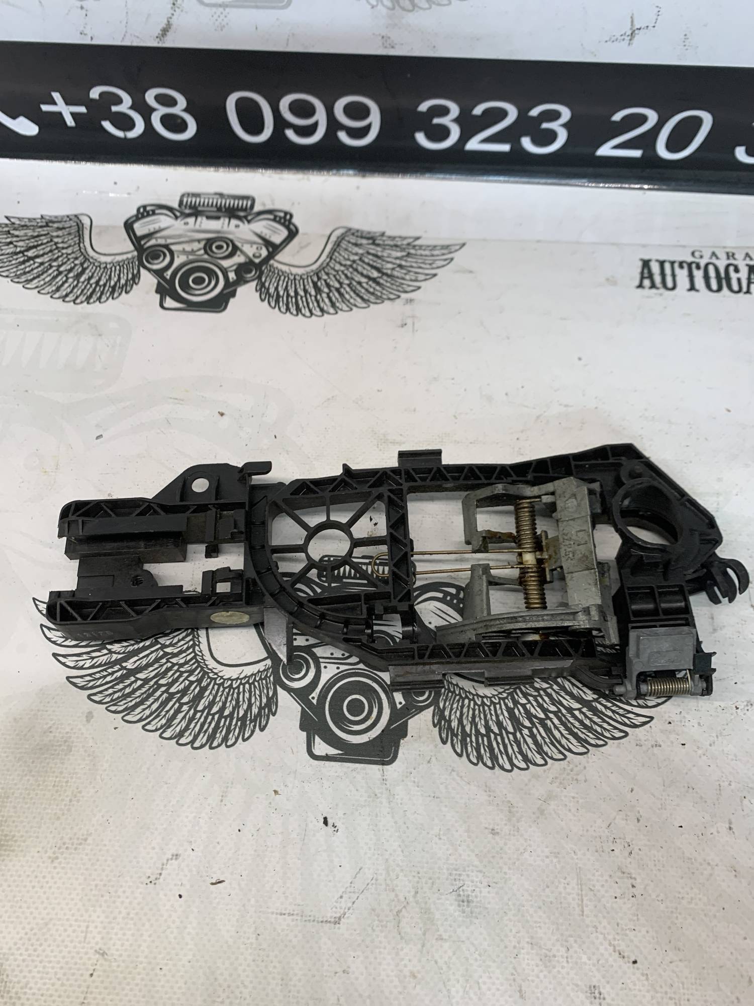Ручка кронштейн двері ліва ззаду VW Passat B6 3c0837885g