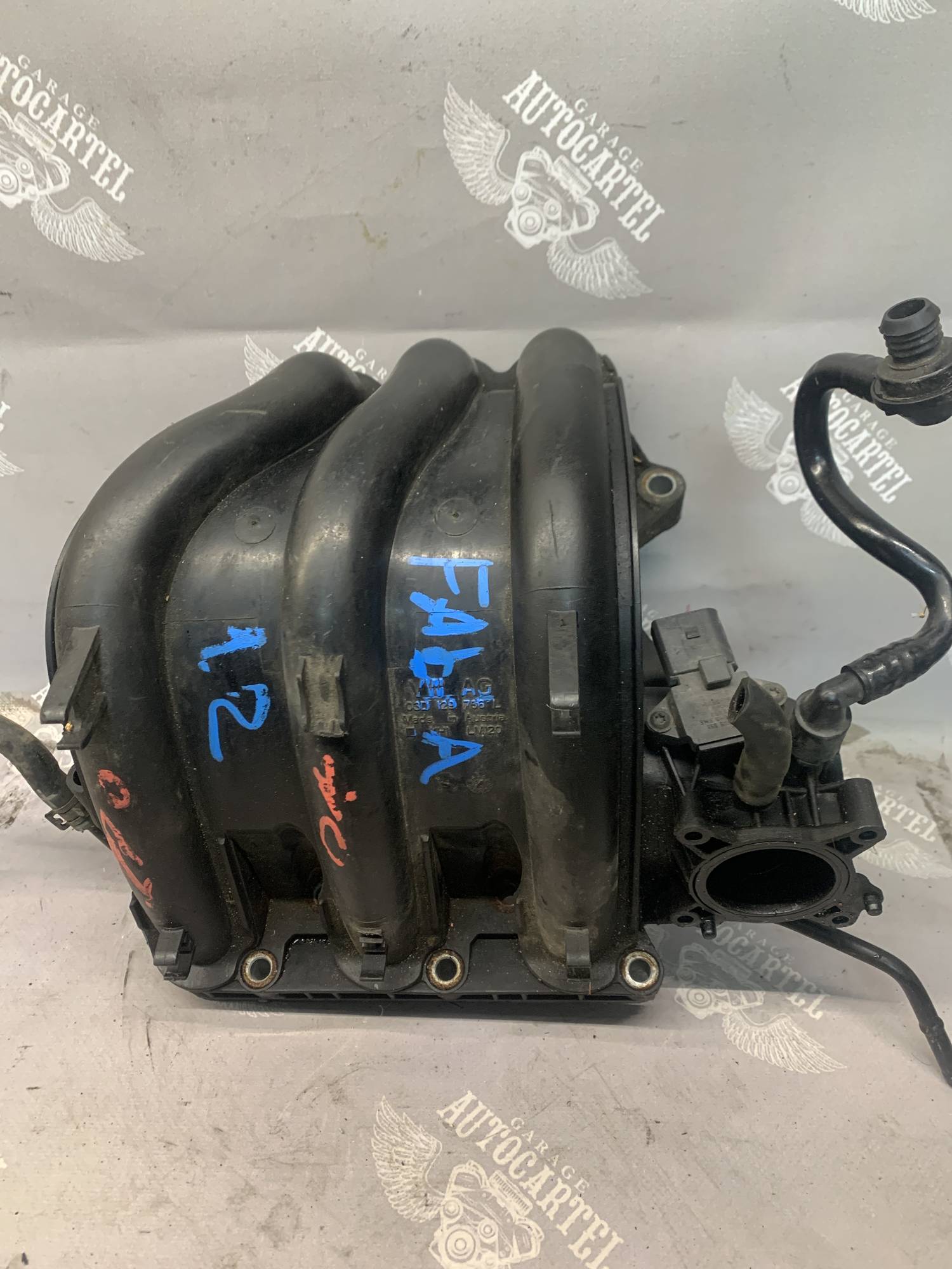 03d129766l Впускний колектор Škoda Fabia I 1999-2007 1.2 6V (40kw)