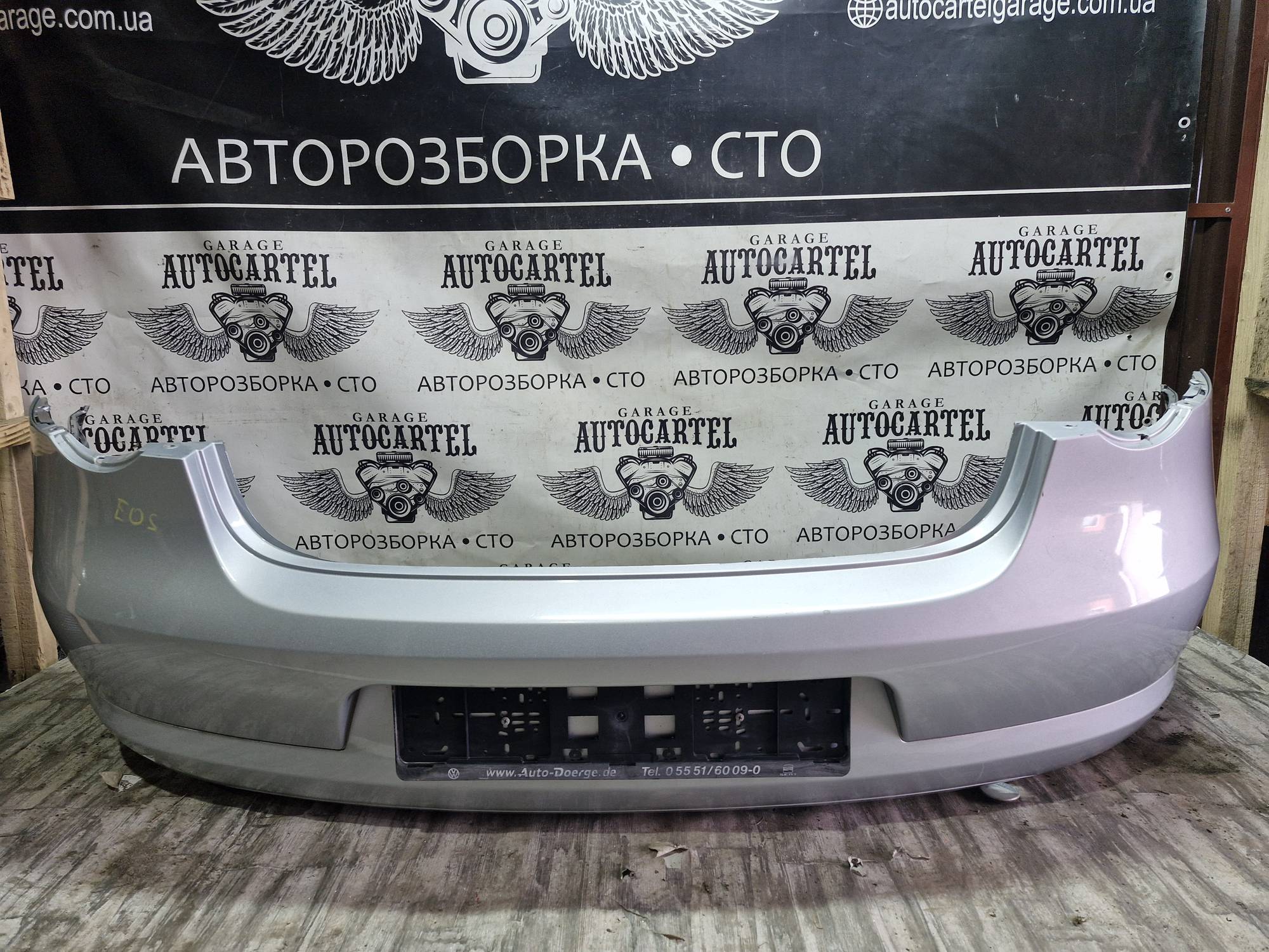 Бампер задній Volkswagen EOS 2006-2015 21647901