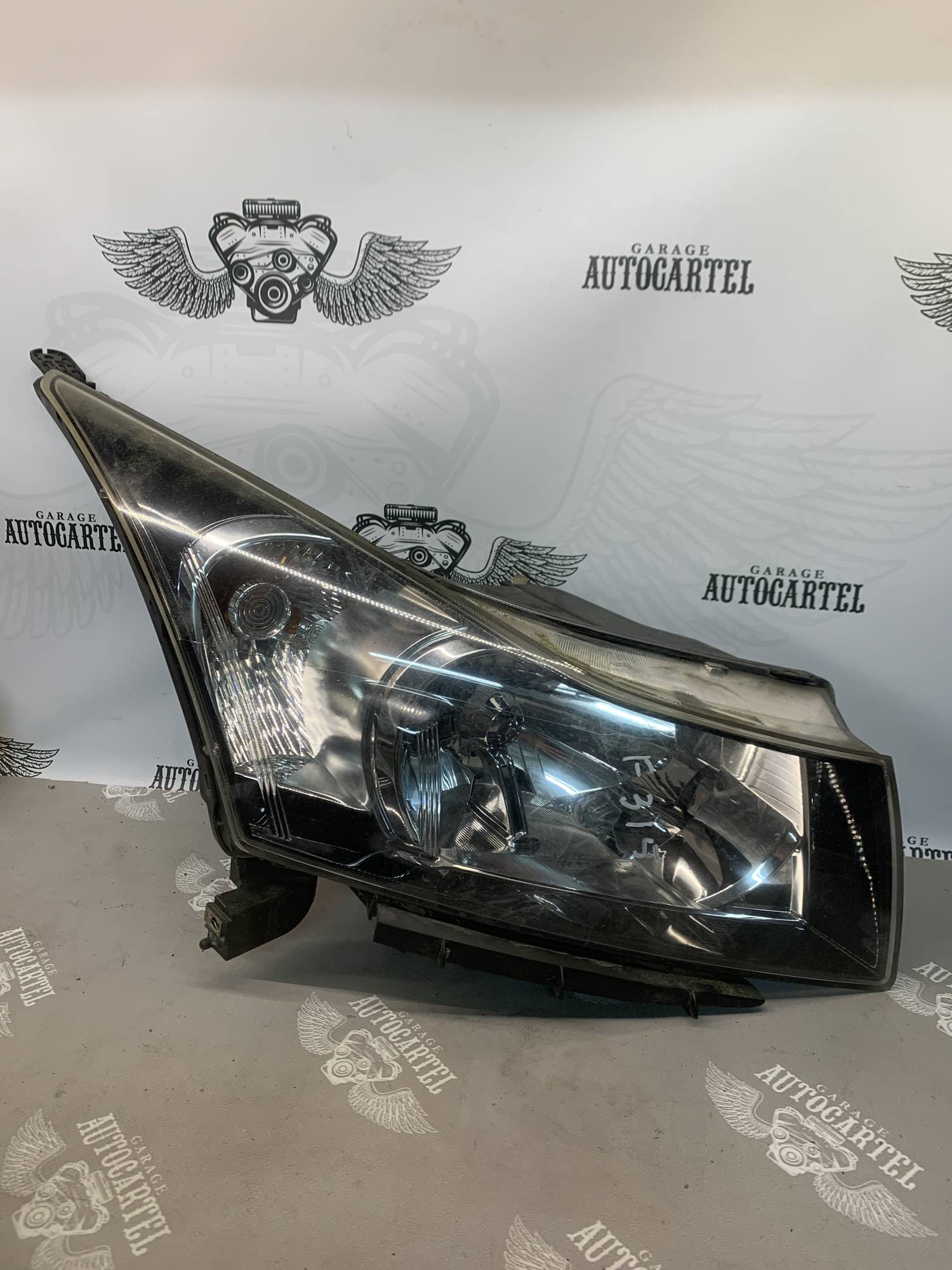 Фара права Chevrolet Cruze 09-12, 95479489