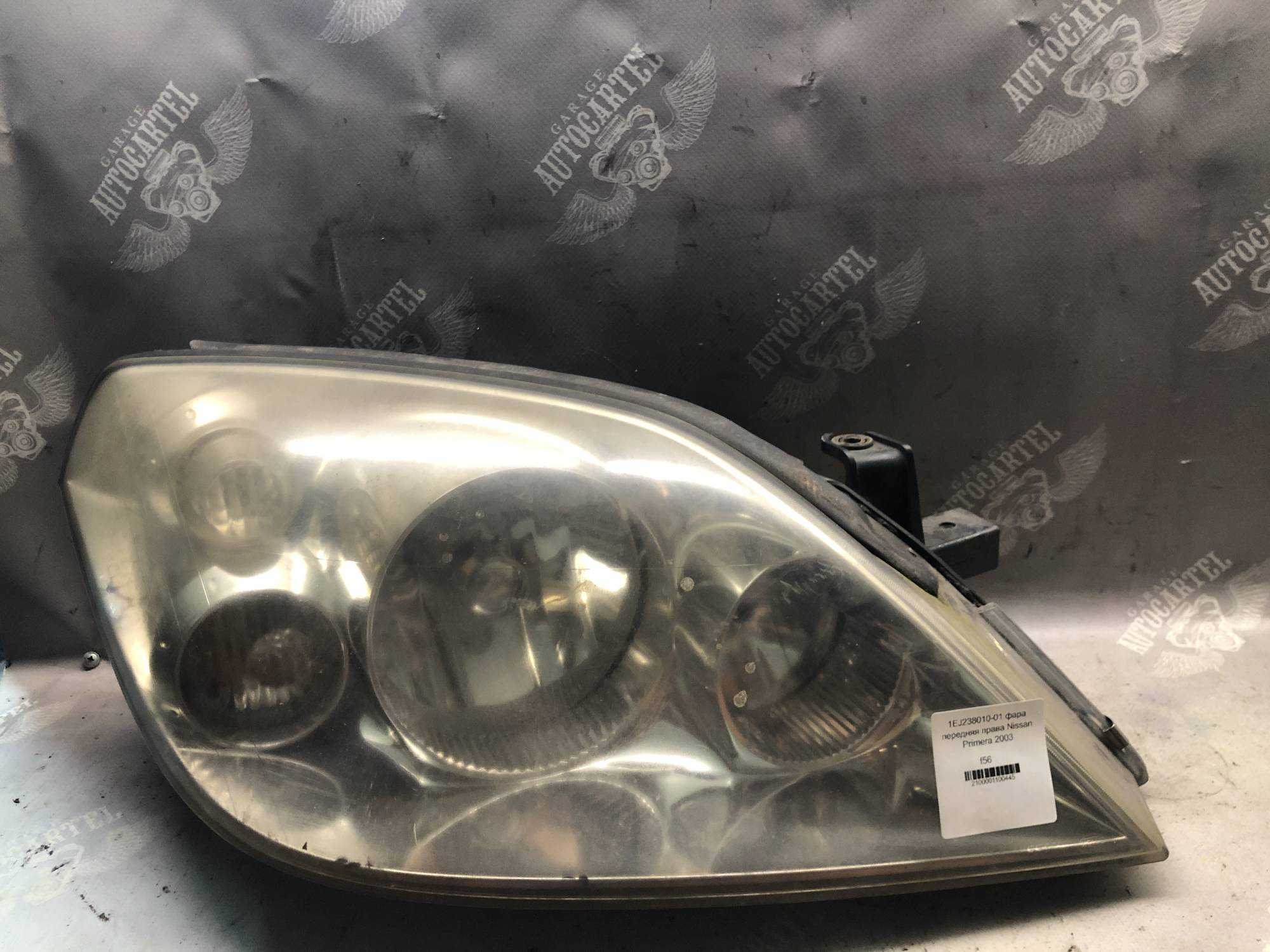 1EJ238010-01 фара передняя права Nissan Primera 2003