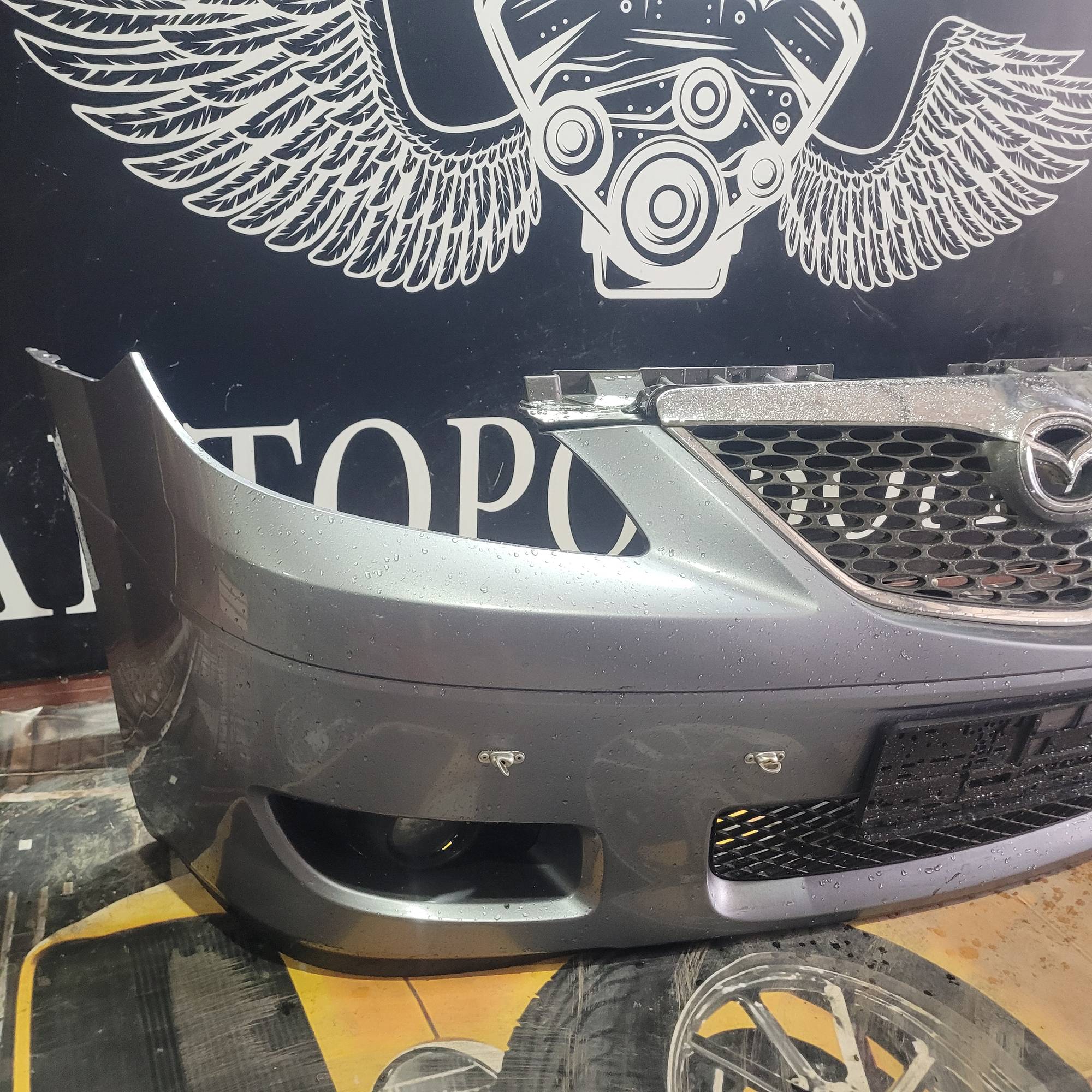 Бампер передній Mazda mpv 21413513