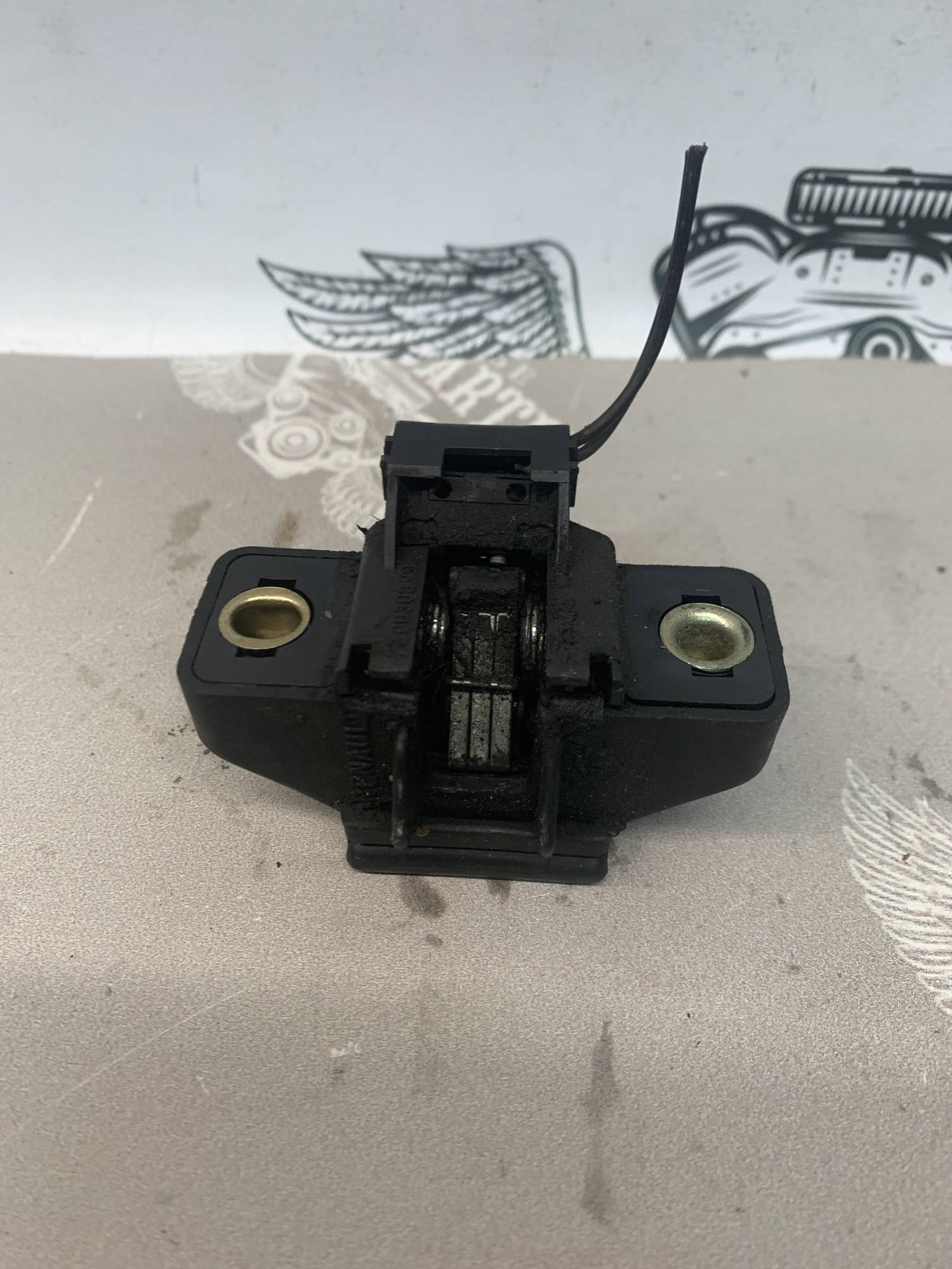 Замок кришки багажника Renault Kangoo 7700308997