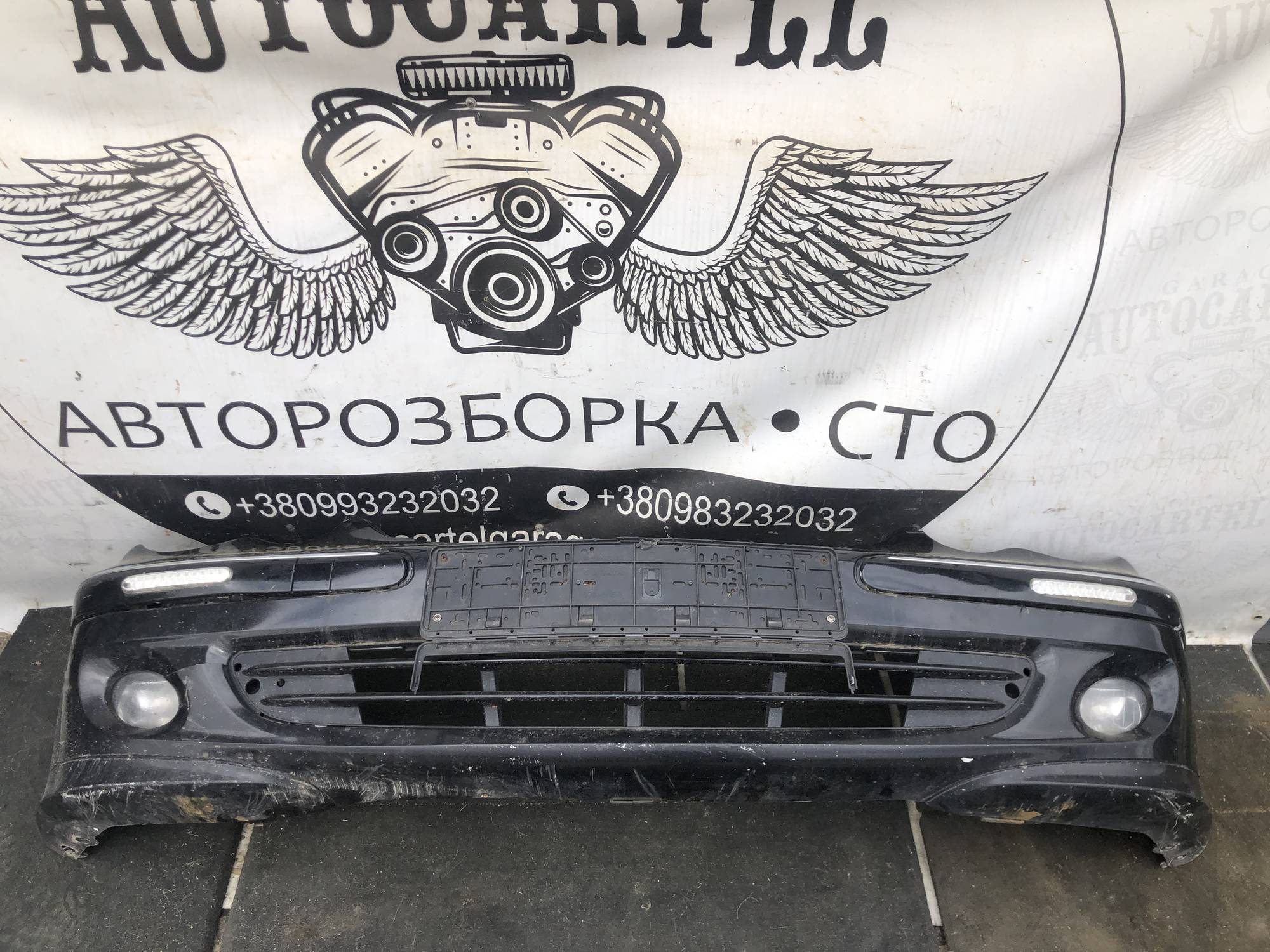 Бампер передній Mercedes W203 21996429