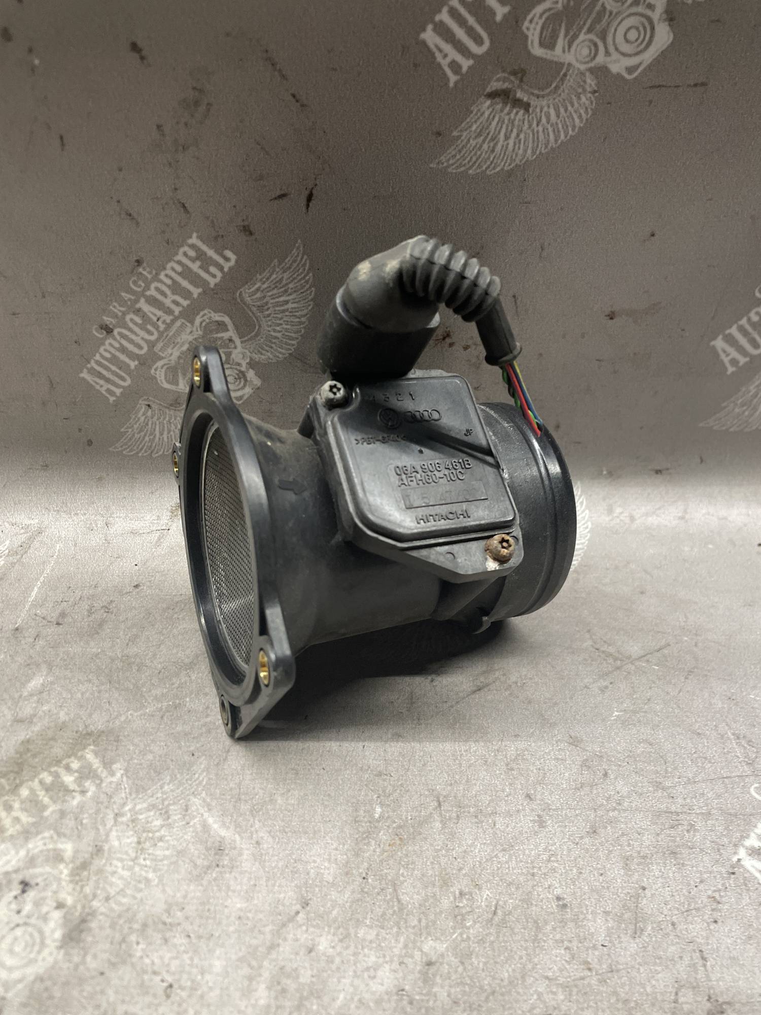 Датчик витрати розходомір повітря Volkswagen Passat B5 Polo Transporter 06a606461b