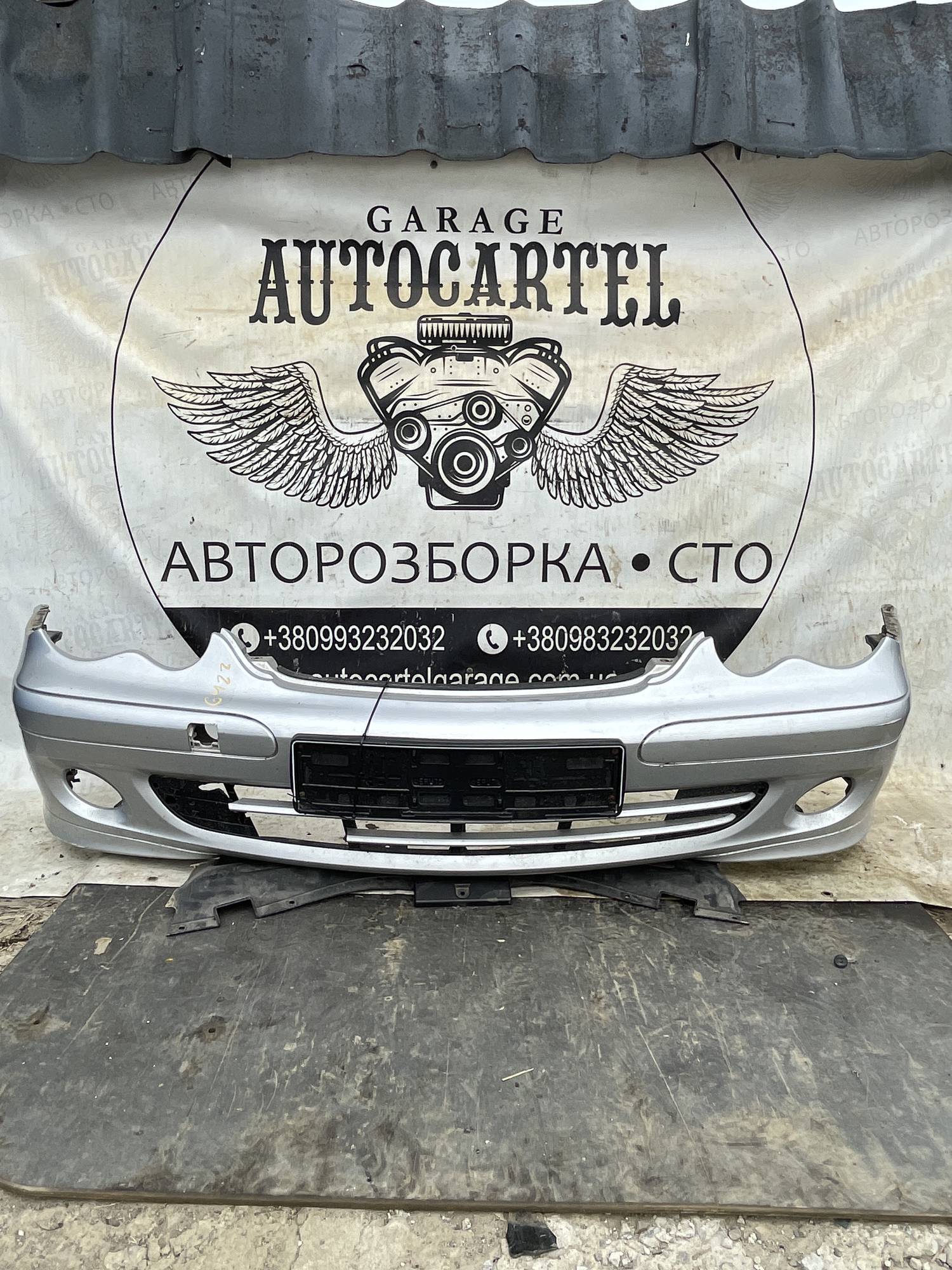 Бампер передній Mercedes W203 21119408