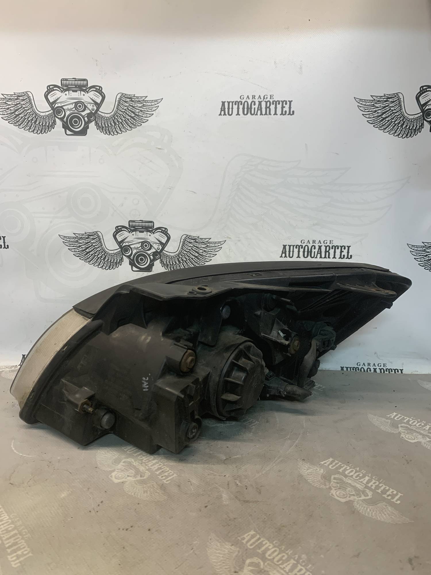 Фара права передня Kia Rio 2 921021g030
