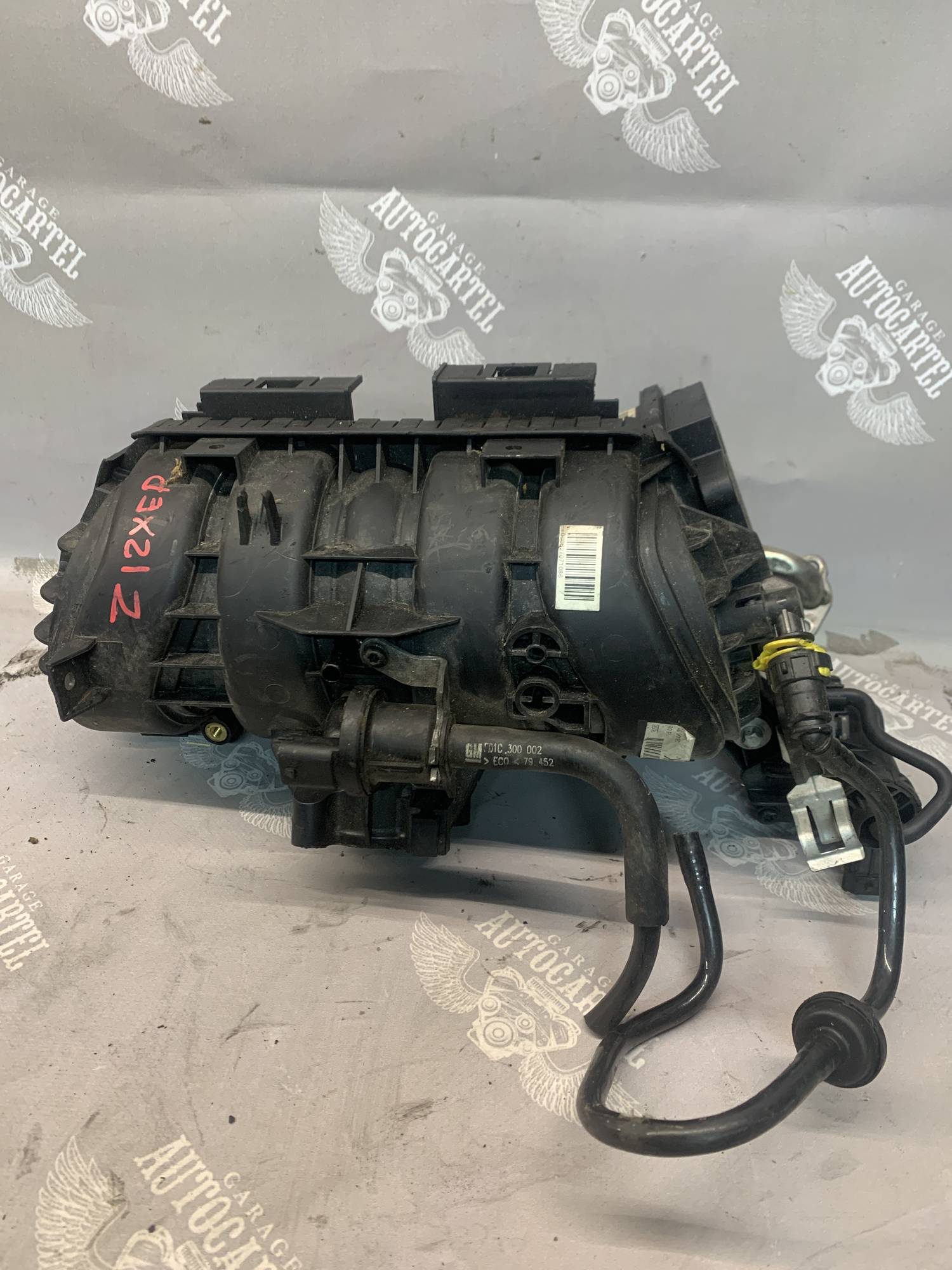 55559829 Колектор впускний Opel Astra H, 1.2/1.4i, 55559829