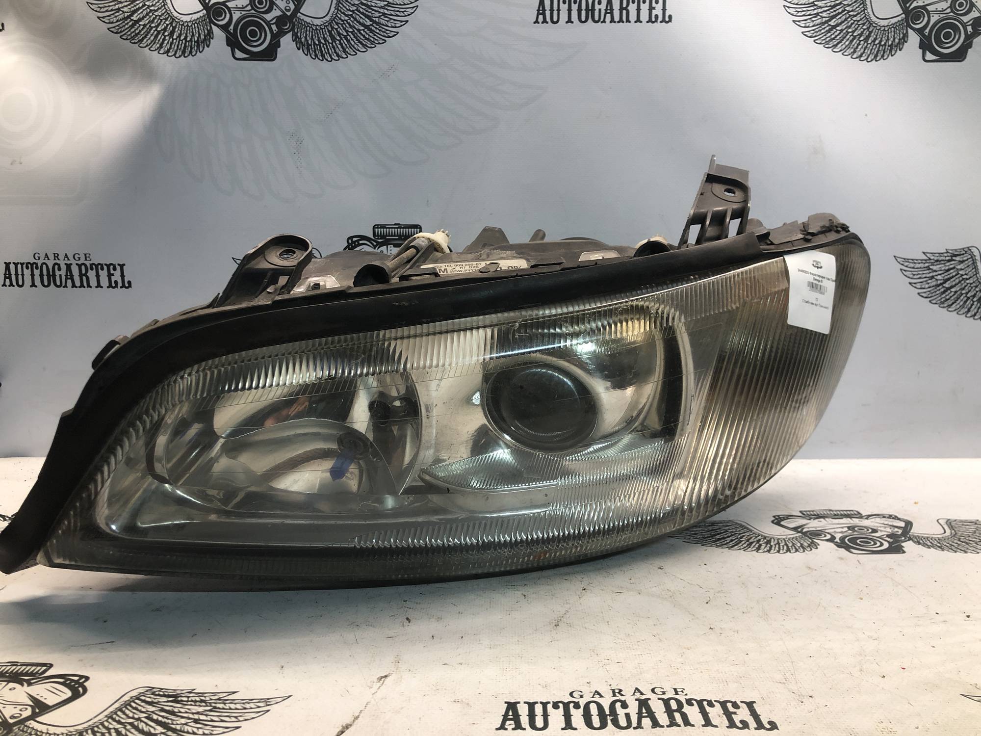24406226 Фара передня ліва Opel Omega B