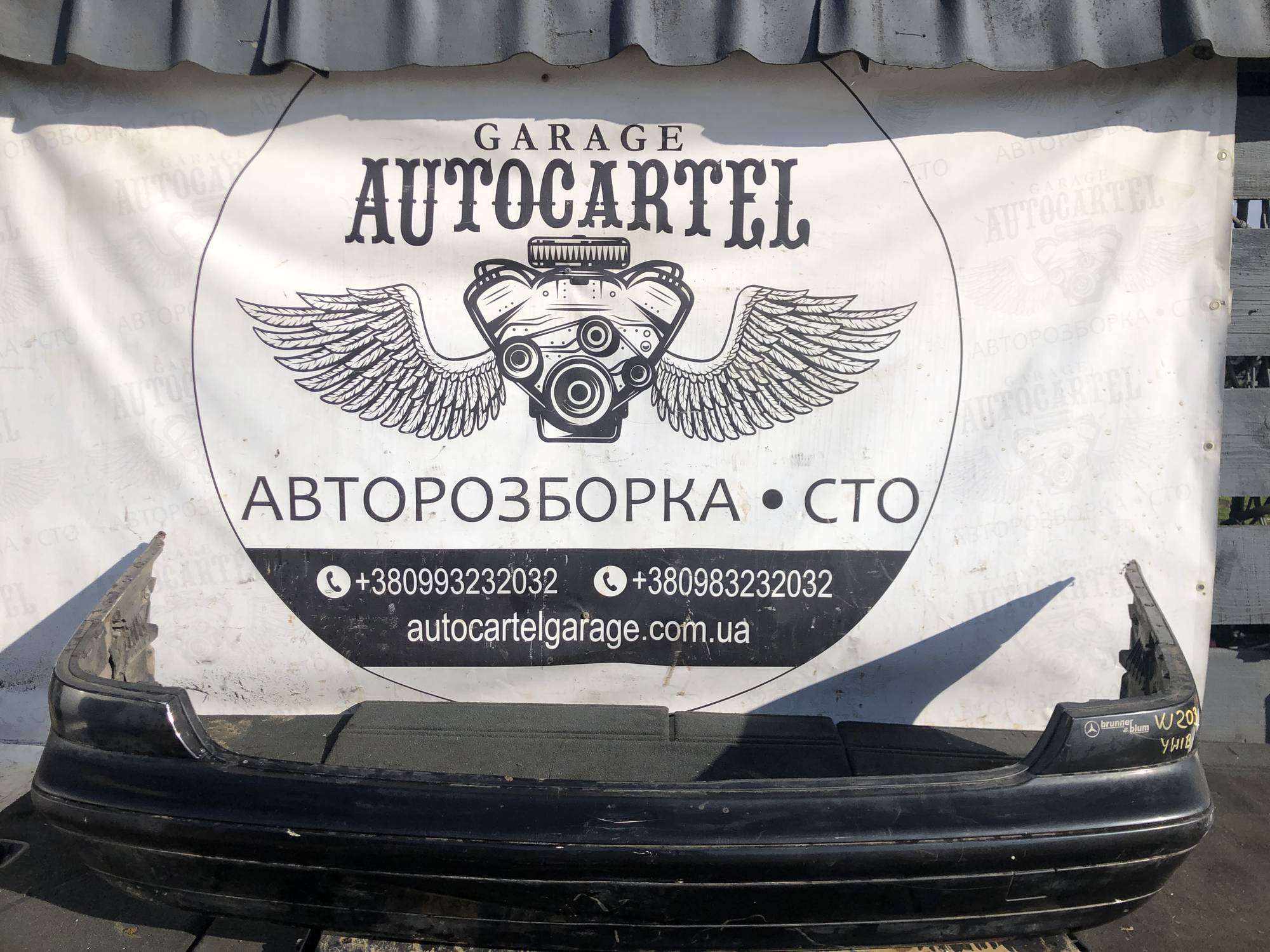 Бампер задній Mercedes W203 унів 21963506