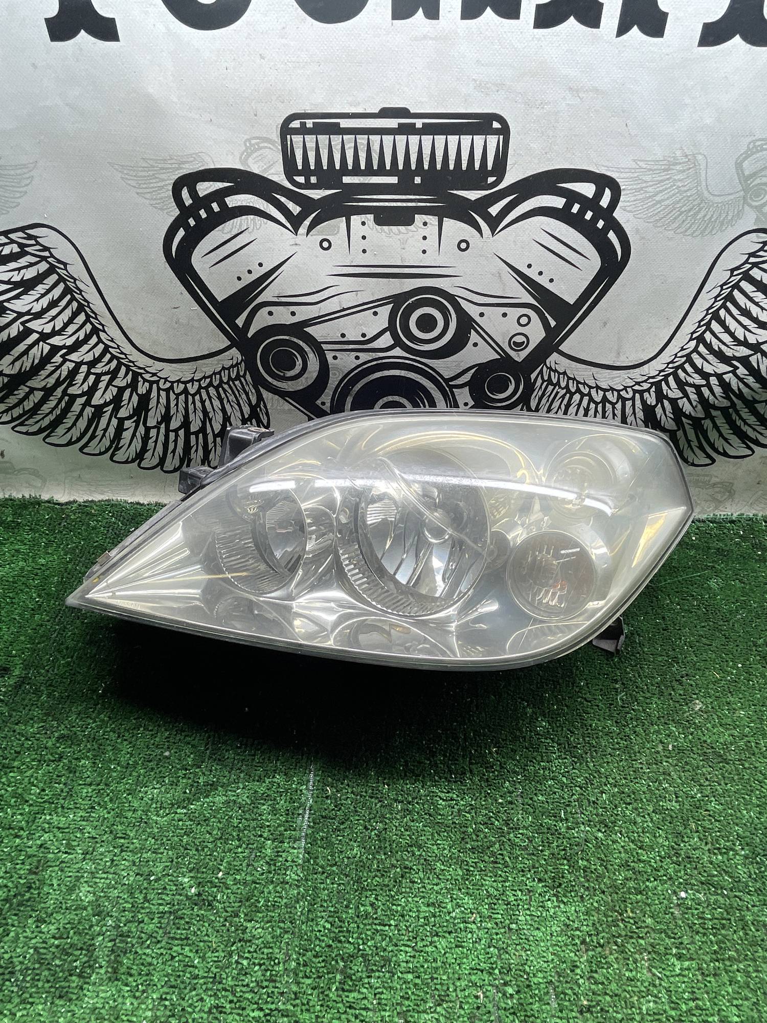 1EJ238010-01 фара передняя ліва Nissan Primera 21110740