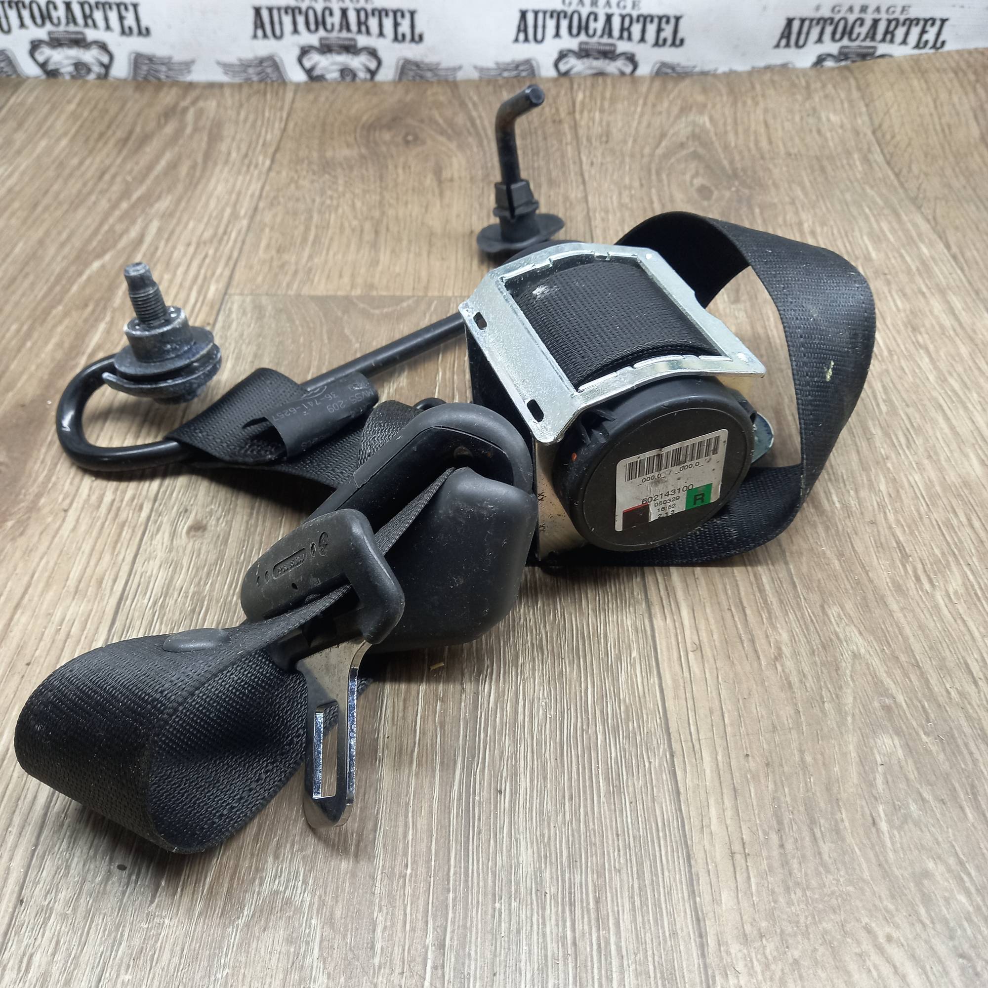 Ремінь безпеки передній правий Opel Astra H 602143100