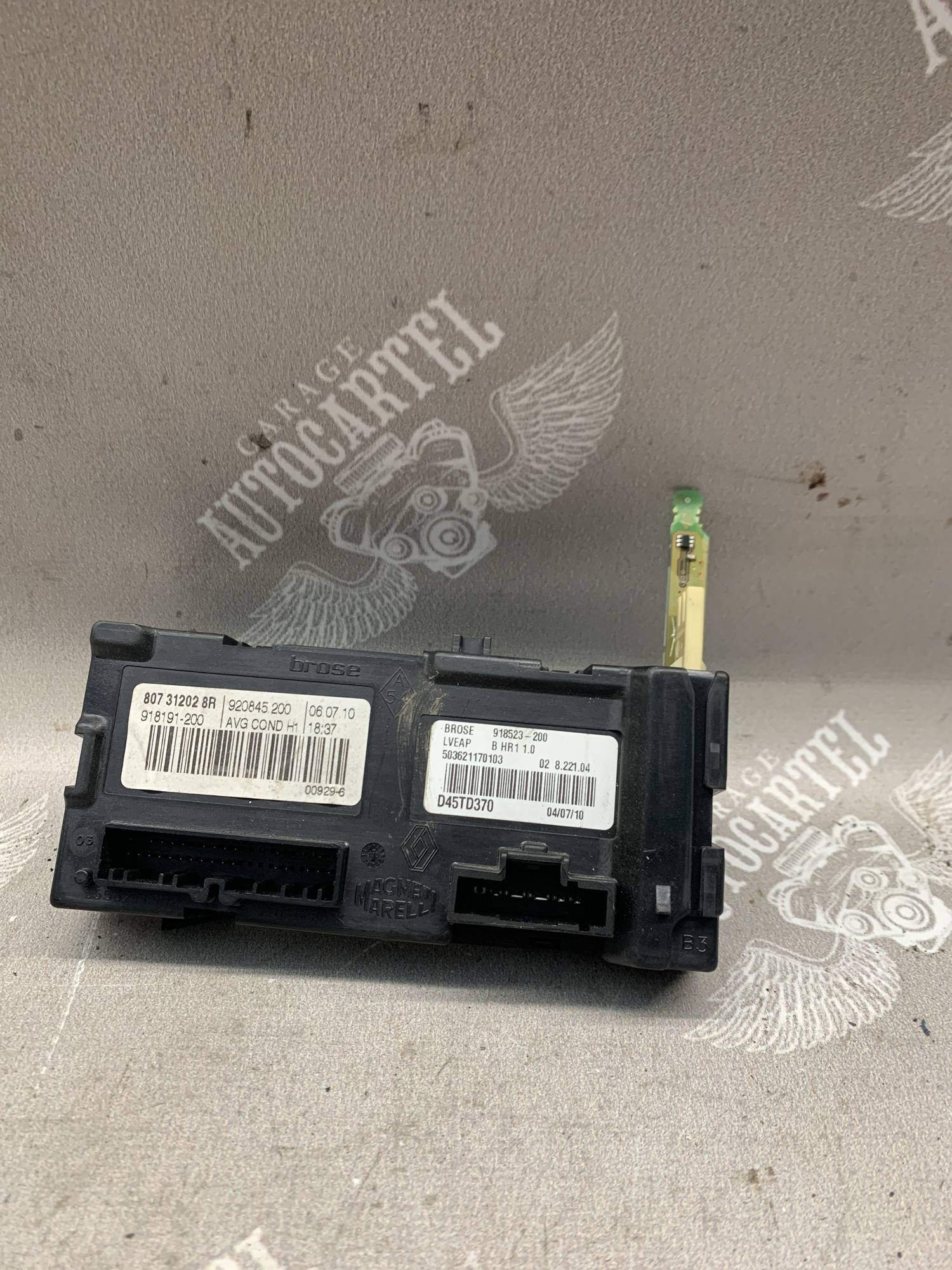 Блок склопідйомника переднього лівого Renault Fluence 807312028r