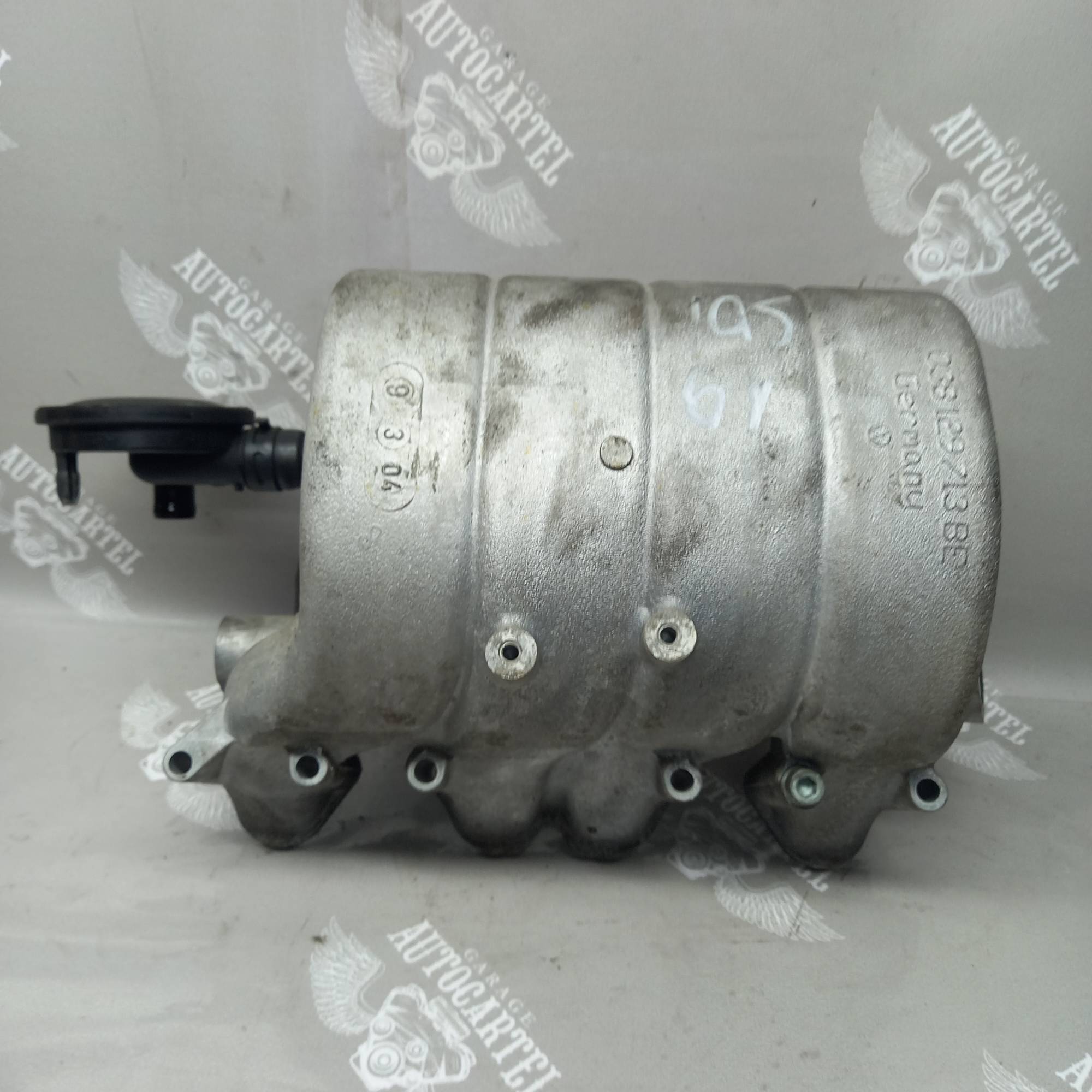 Впускний колектор 2.0 SDI Volkswagen Caddy III Golf V 038129713be