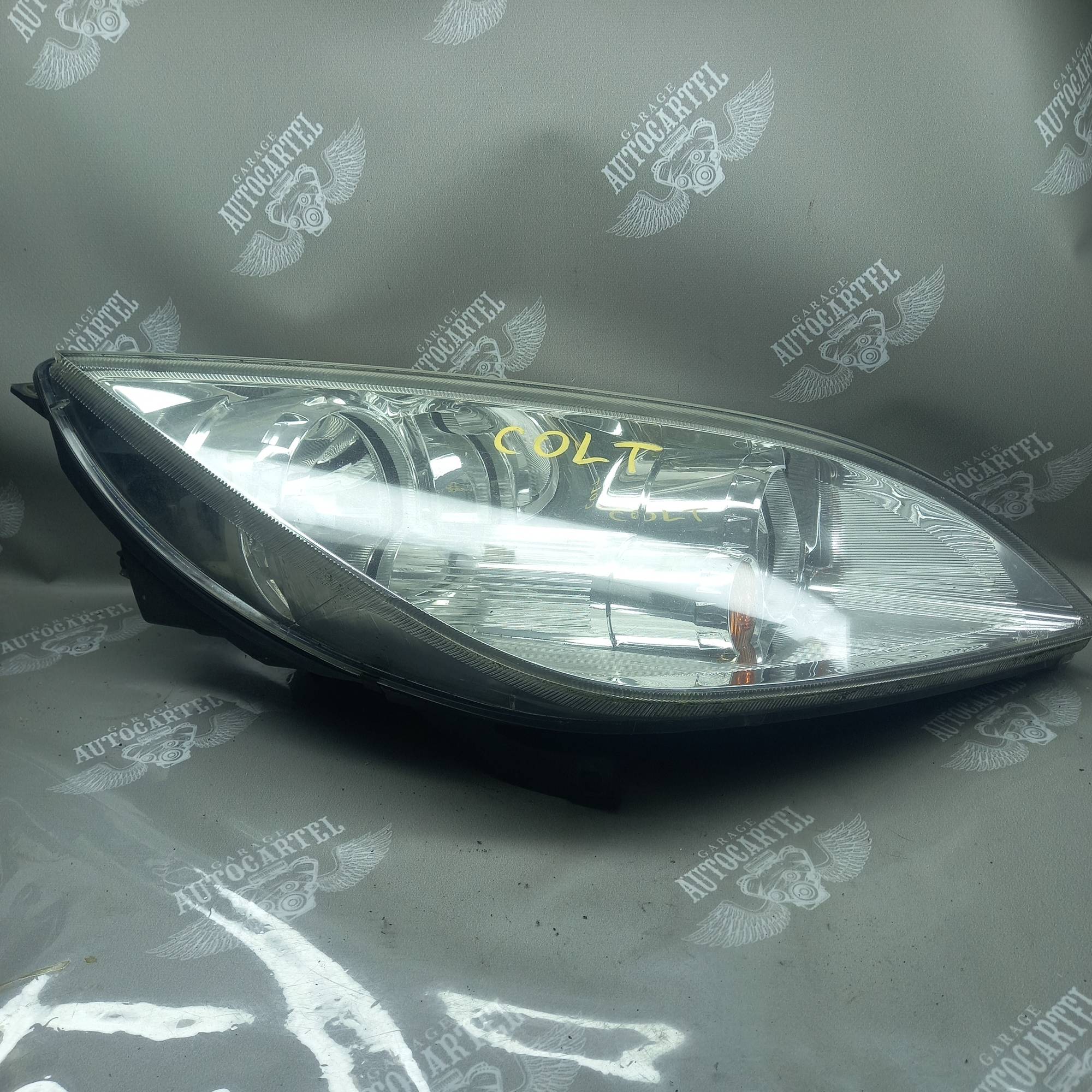 Фара права -09 Mitsubishi Colt (Z3) 2004-2012 mr957354