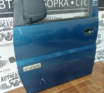 Двері передні ліві Hyundai H1 ST0353