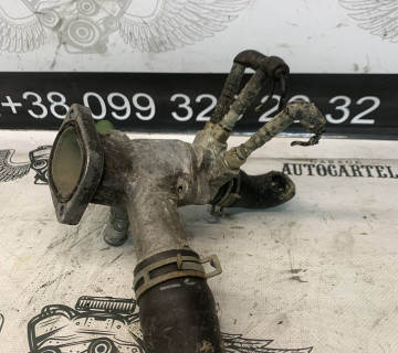 Фланець охолоджувальної рідини Volkswagen Bora Golf 028121145b