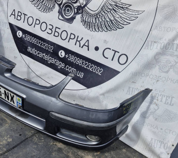 Бампер передній Nissan Almera Tino 1998-2006 21685385