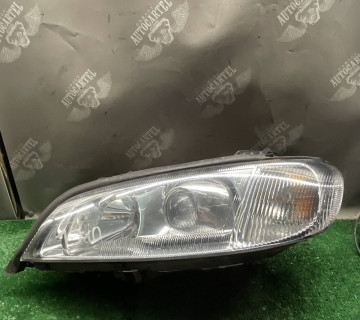 Фара передня ліва ксенон Opel omega b рестайлінг 1el009050-21