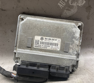 Блок керування двигуном vw passat b6 1.6 mpi 06a906033at
